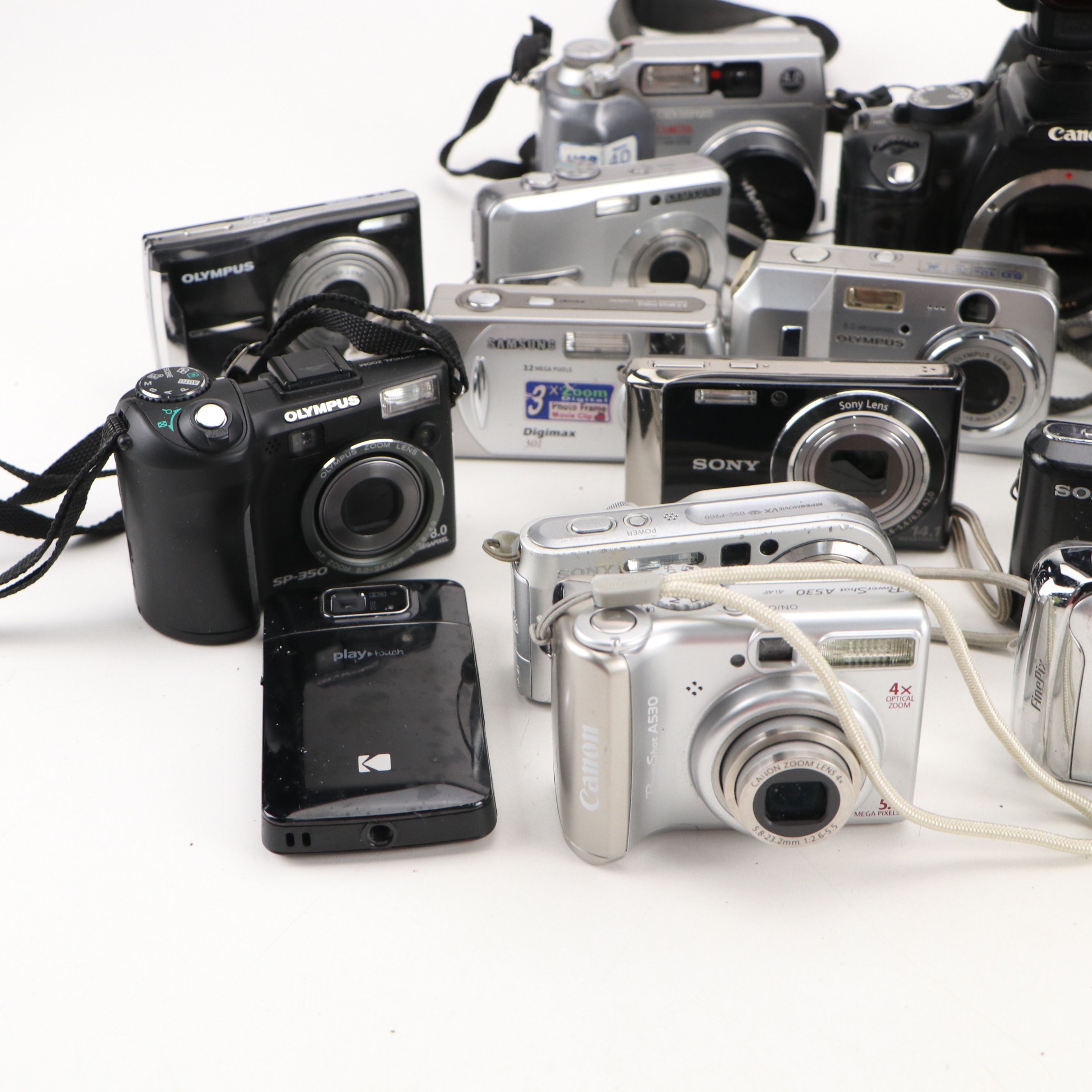 Sony Digital Mavica, Canon Digital Rebel XT, Hitachi DVD Cam, and More Cameras
