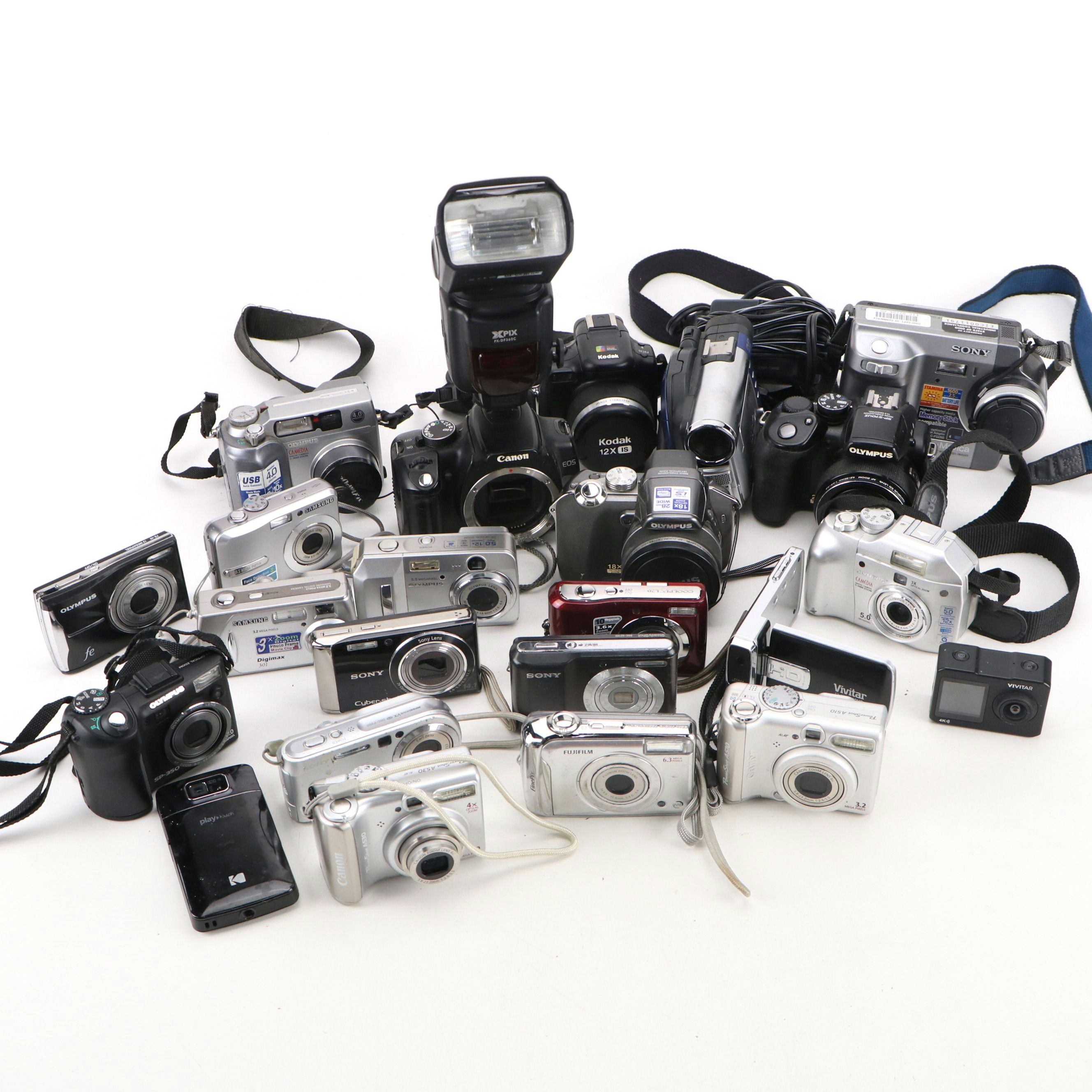 Sony Digital Mavica, Canon Digital Rebel XT, Hitachi DVD Cam, and More Cameras