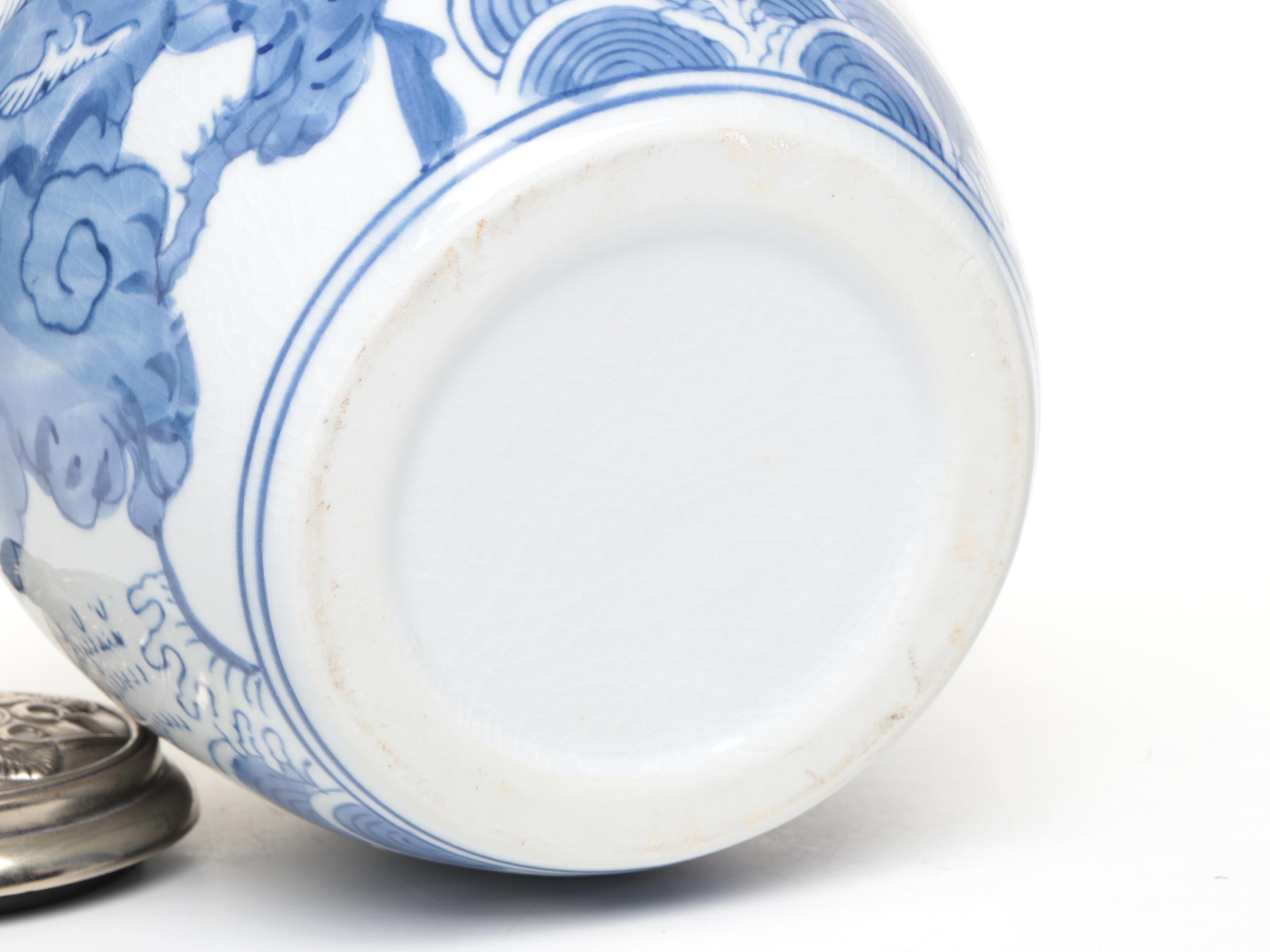 Chinese Style Porcelain Ginger Jar with Metal Embellishments and Other Decor