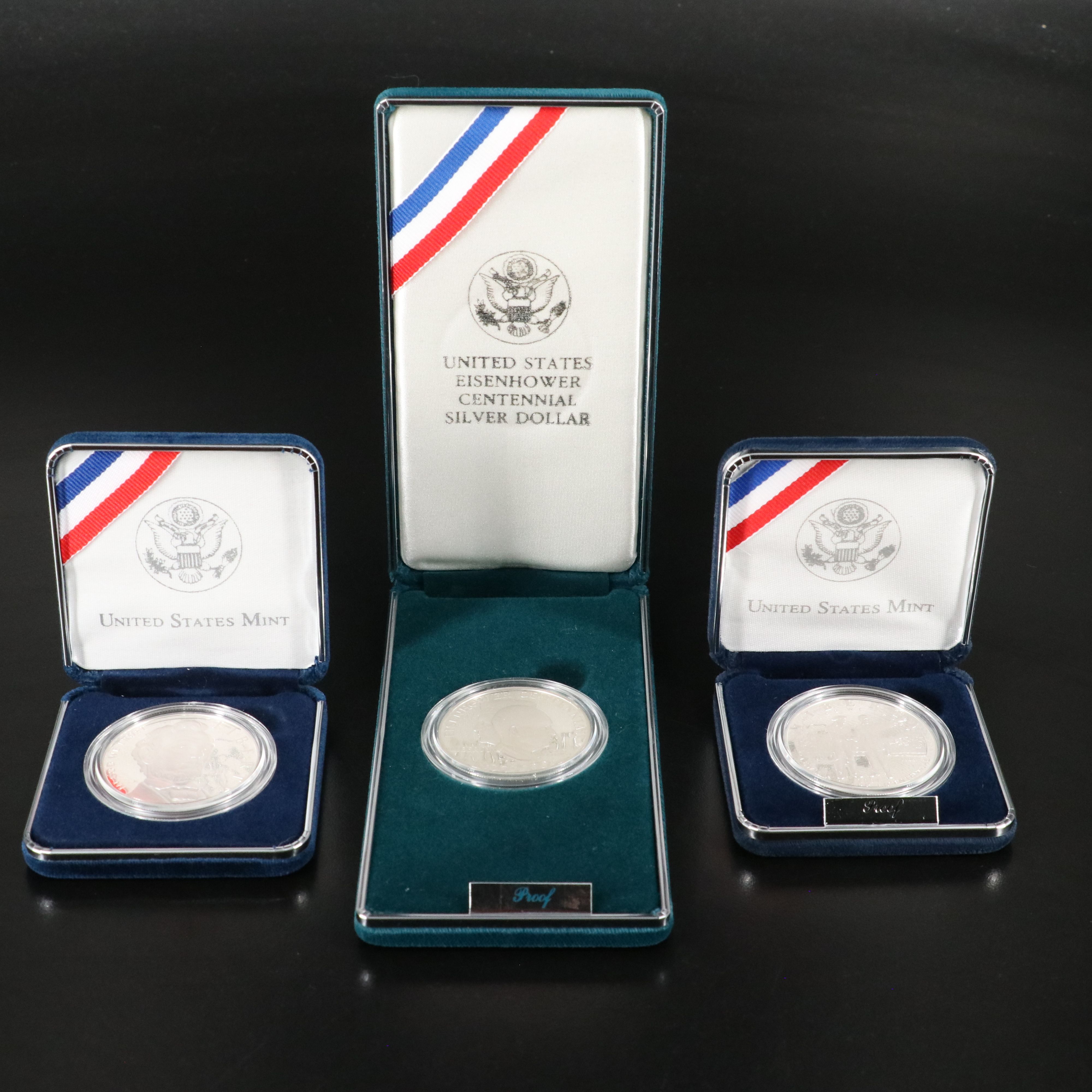 Three U.S. Modern Proof Silver Dollars Including an 1990 Eisenhower Dollar
