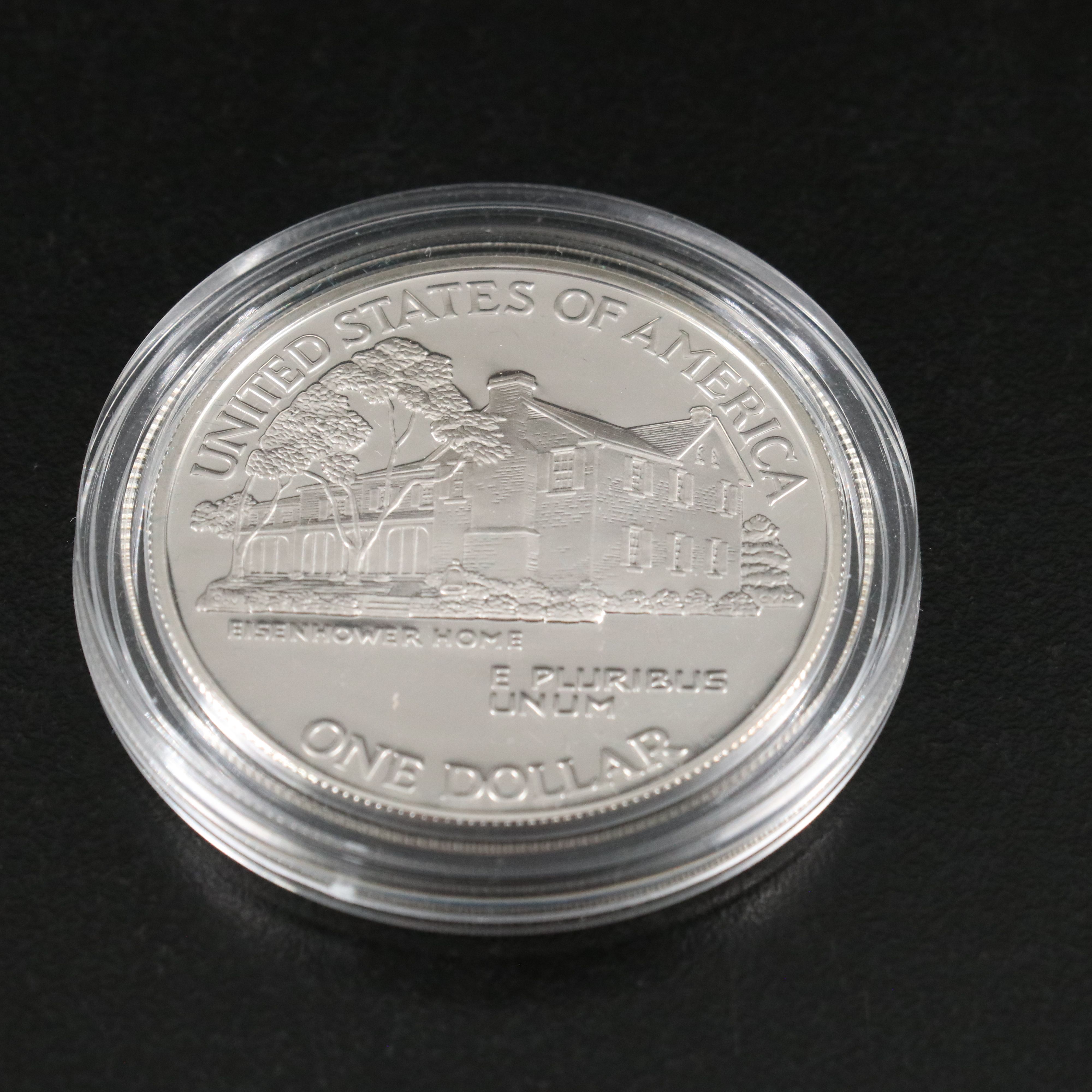 Three U.S. Modern Proof Silver Dollars Including an 1990 Eisenhower Dollar