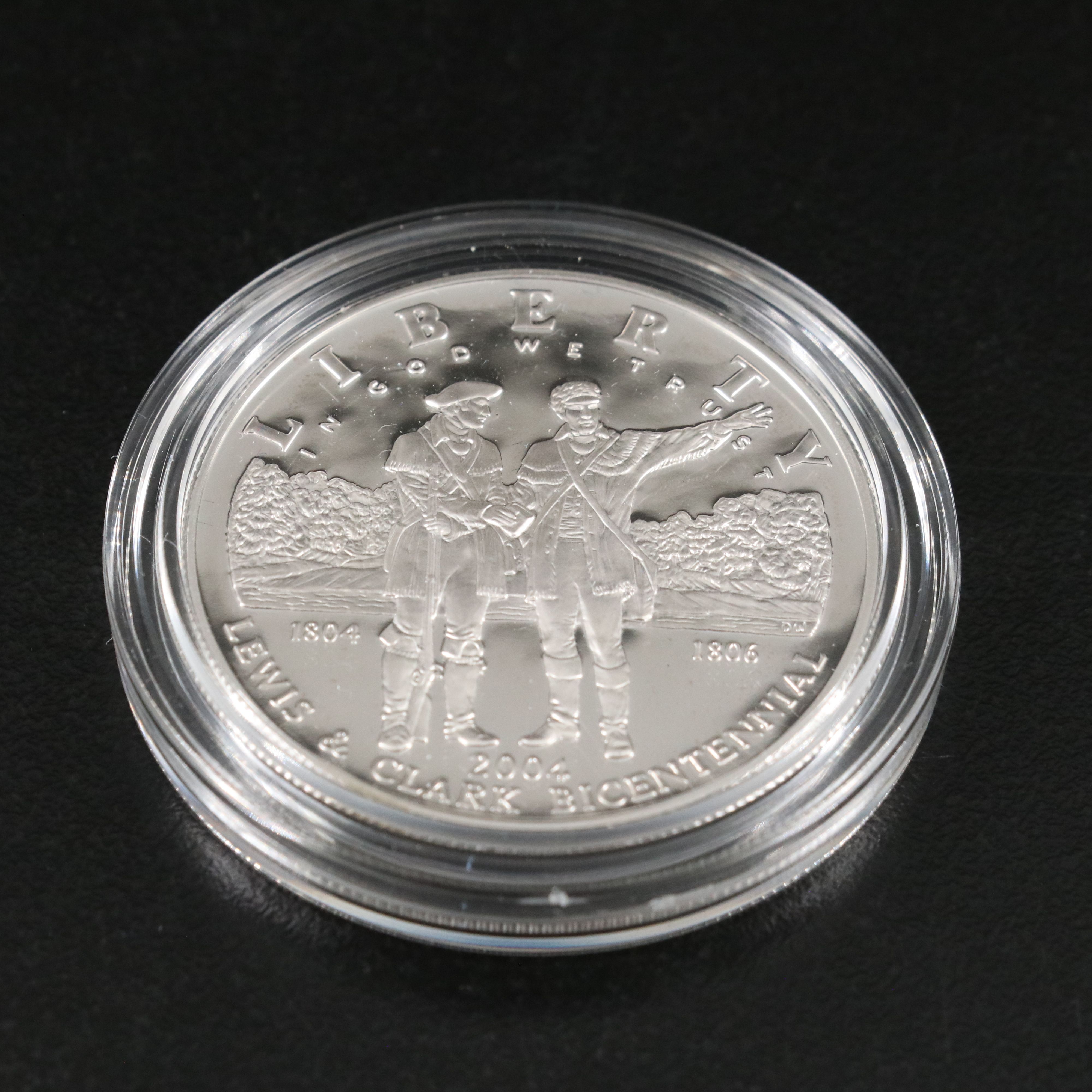 Three U.S. Modern Proof Silver Dollars Including an 1990 Eisenhower Dollar