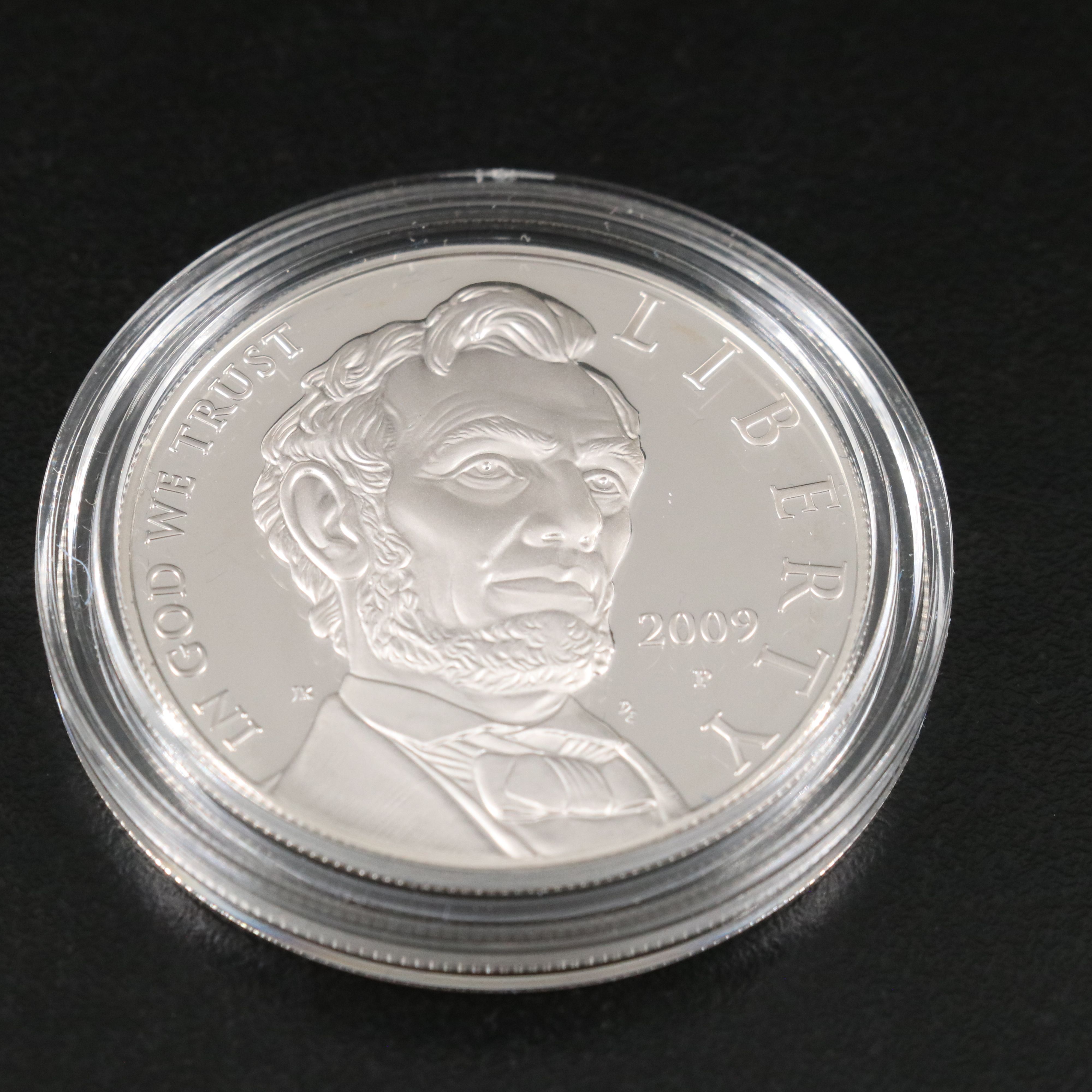 Three U.S. Modern Proof Silver Dollars Including an 1990 Eisenhower Dollar