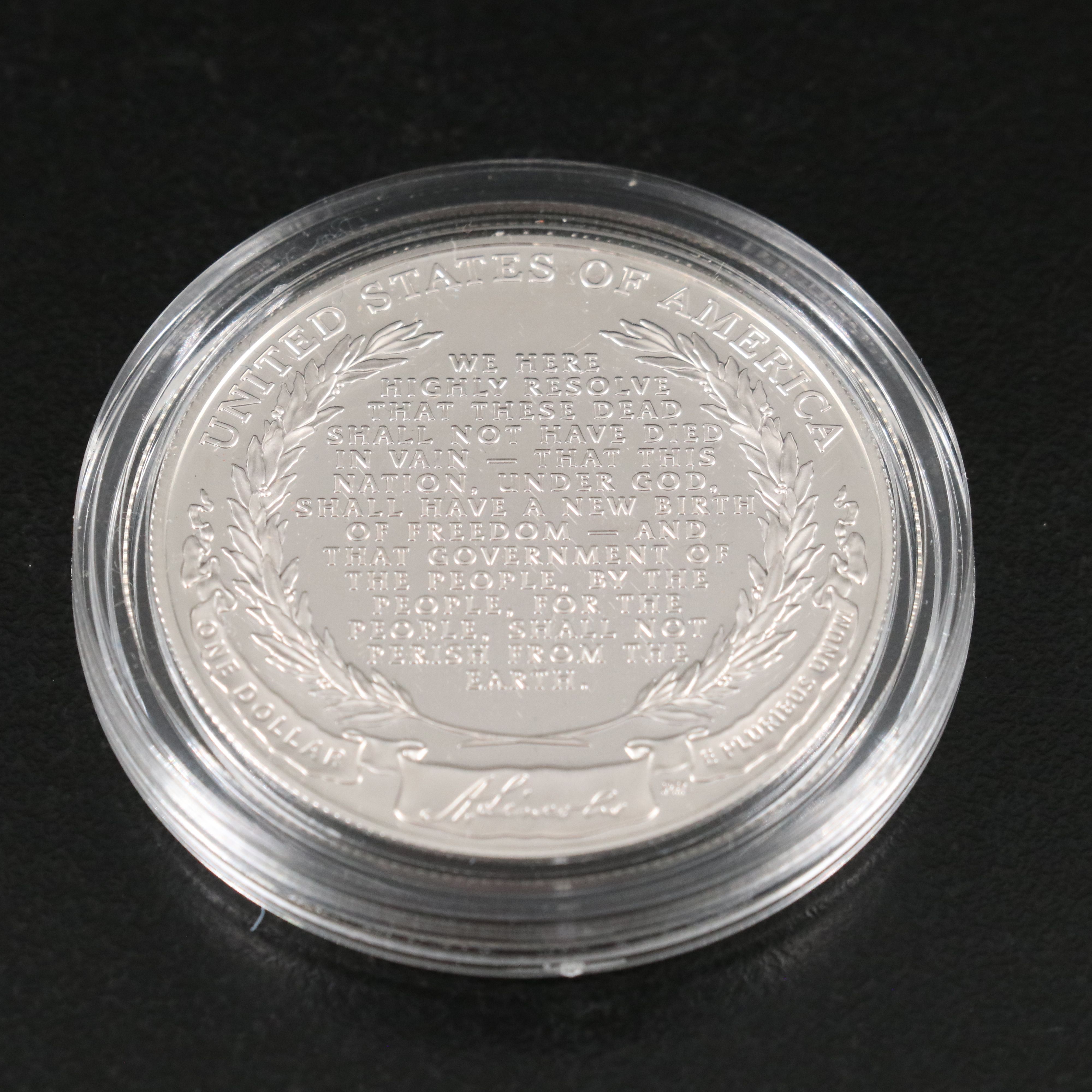 Three U.S. Modern Proof Silver Dollars Including an 1990 Eisenhower Dollar