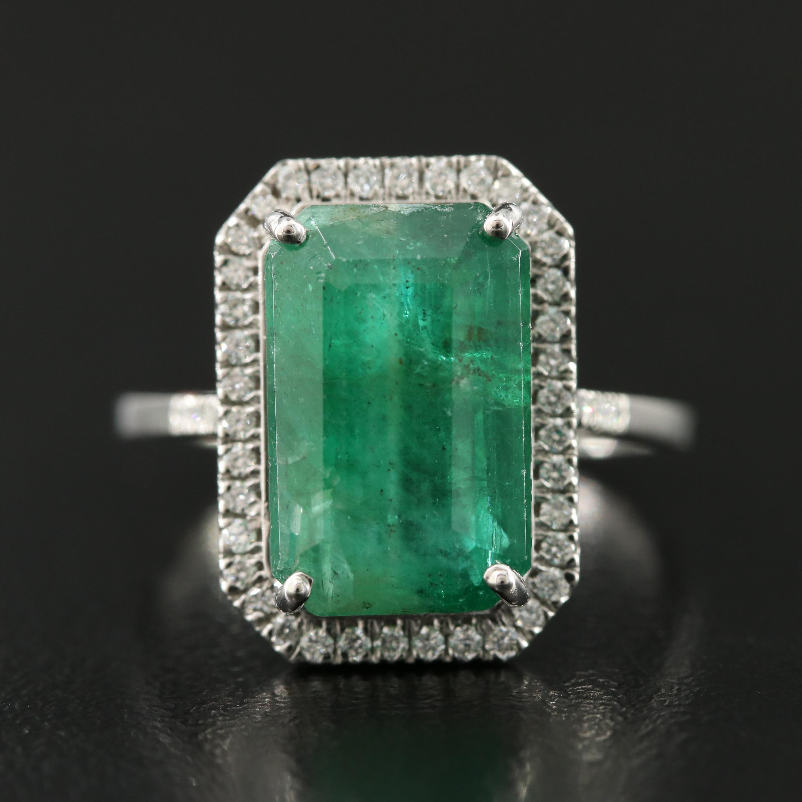 Platinum 6.00 CT Emerald and 0.23 CTW Diamond Ring