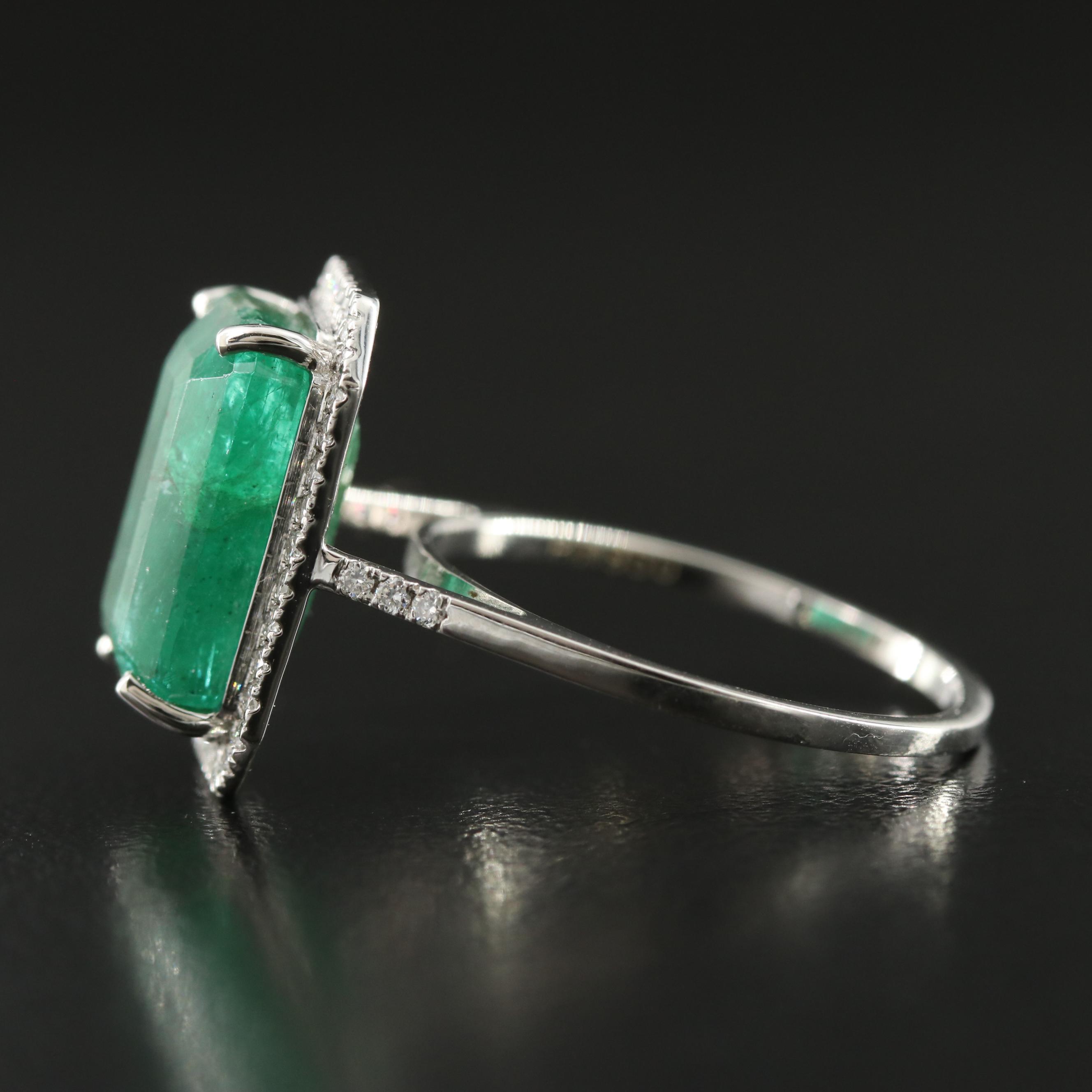 Platinum 6.00 CT Emerald and 0.23 CTW Diamond Ring