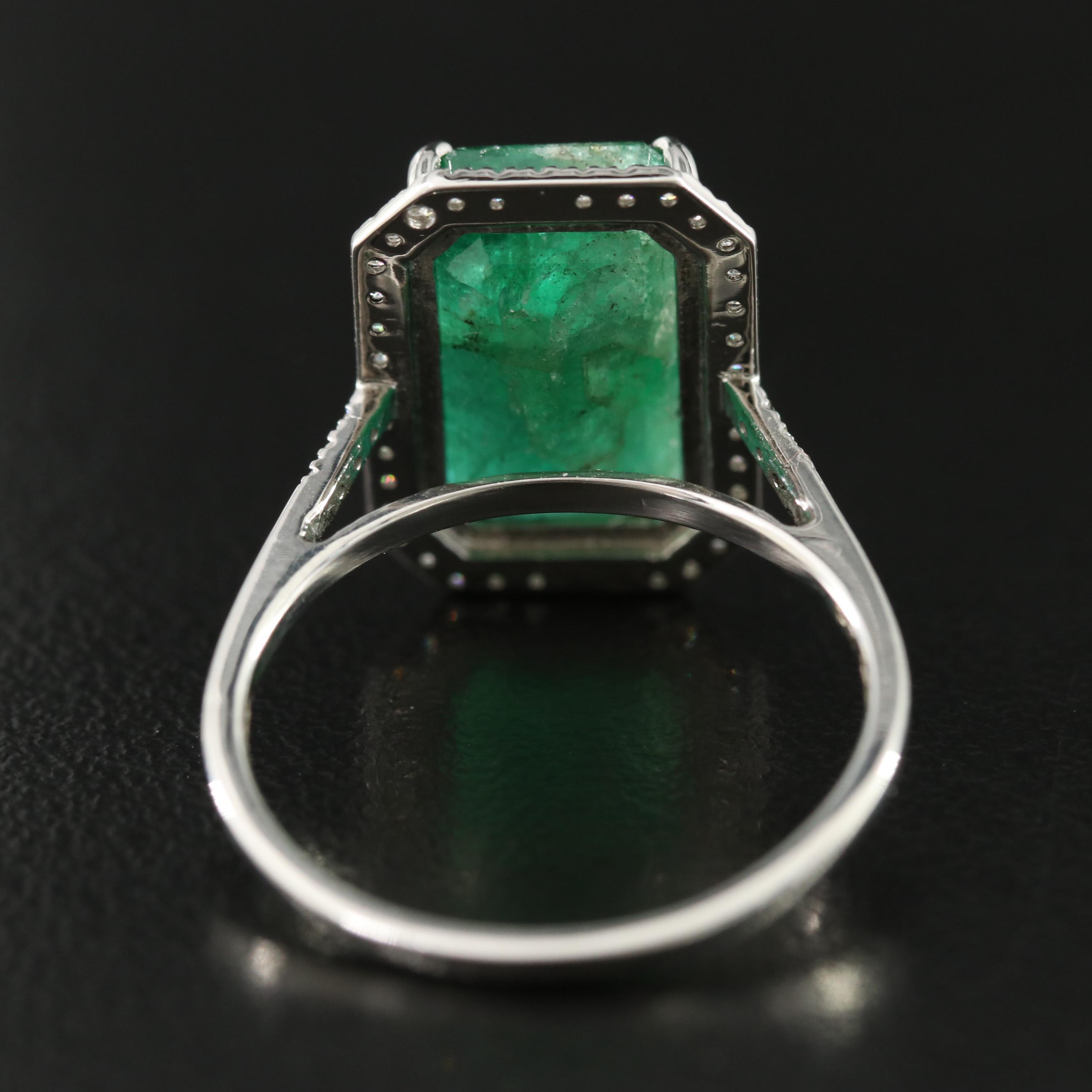 Platinum 6.00 CT Emerald and 0.23 CTW Diamond Ring