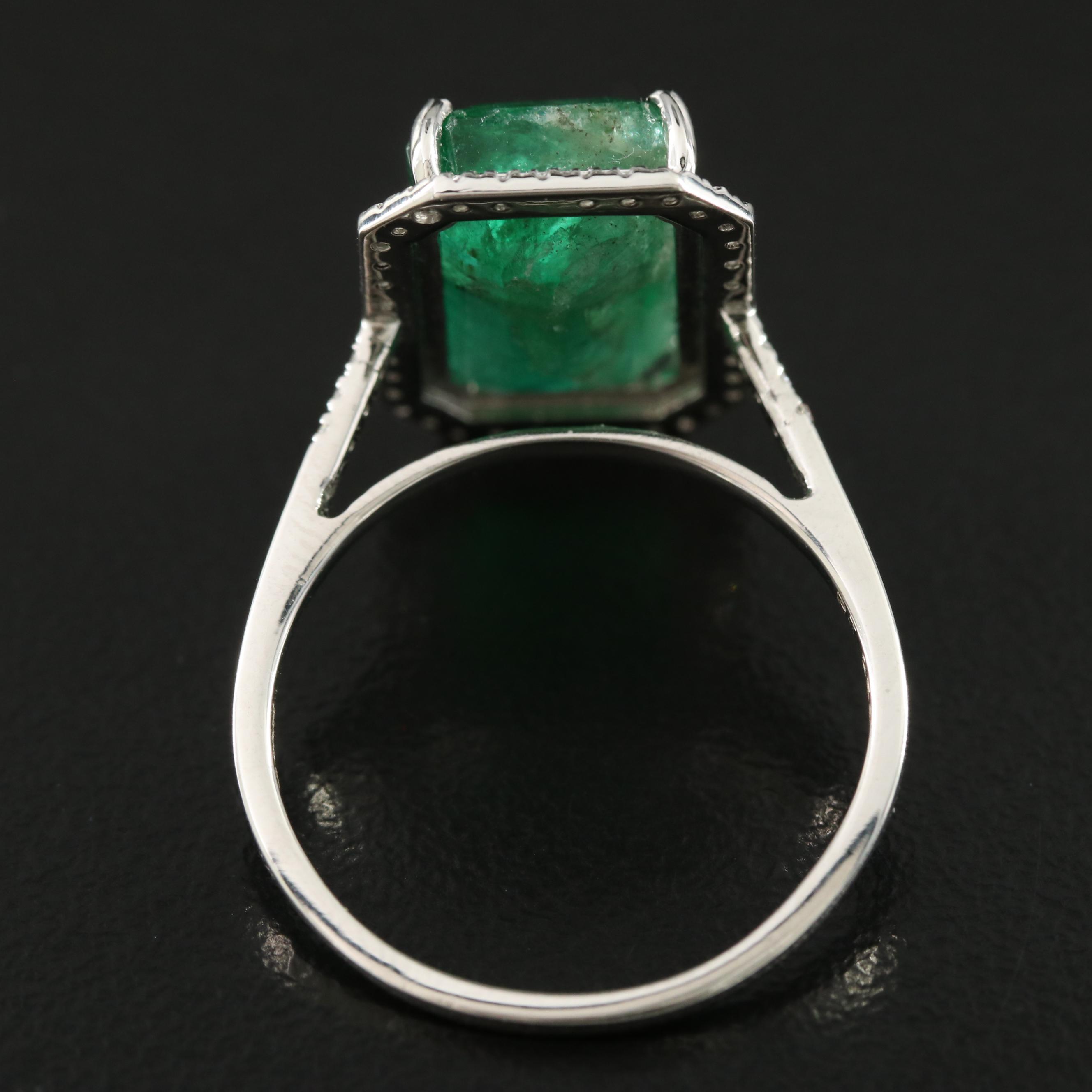 Platinum 6.00 CT Emerald and 0.23 CTW Diamond Ring