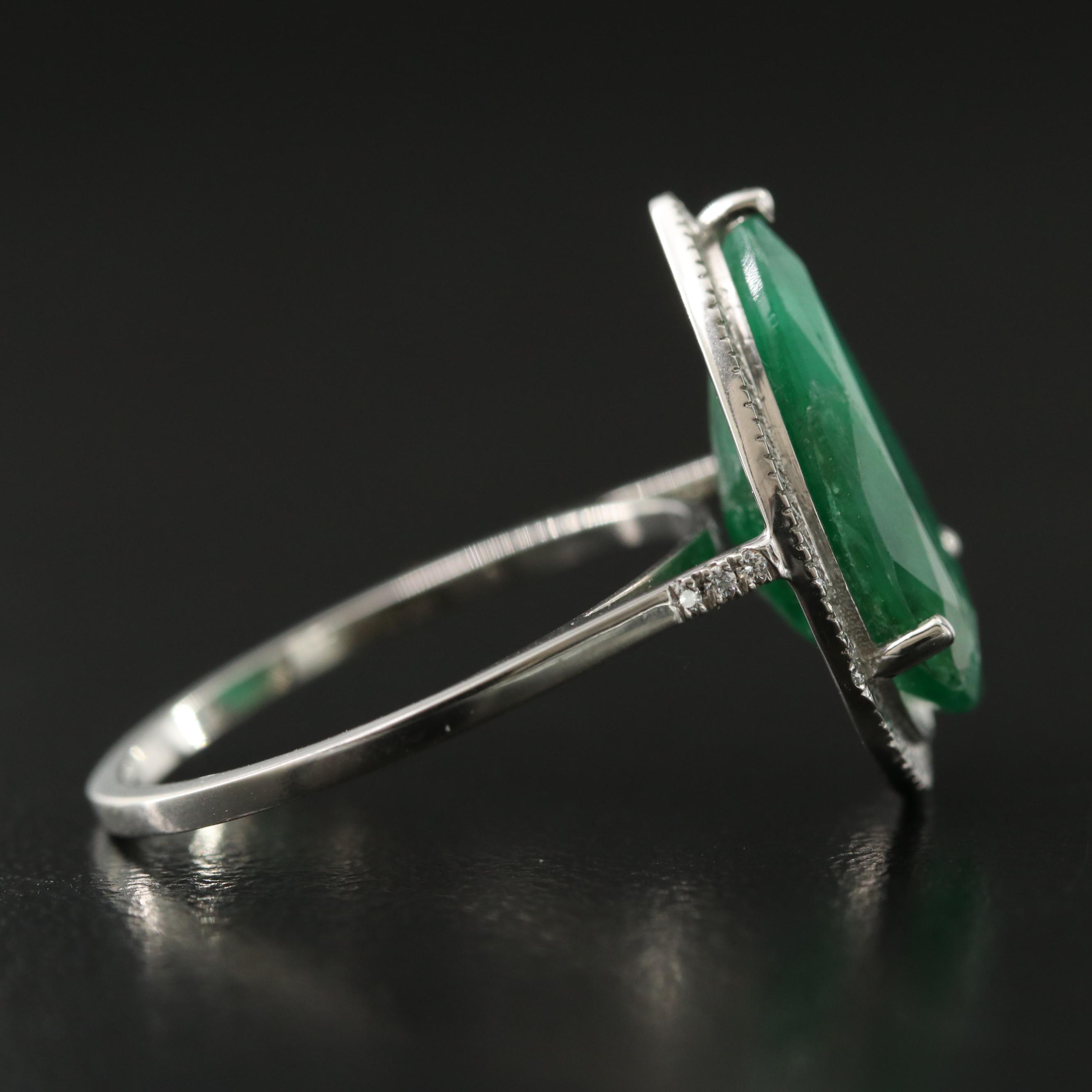 Platinum 4.95 CT Emerald and 0.16 CTW Diamond Ring