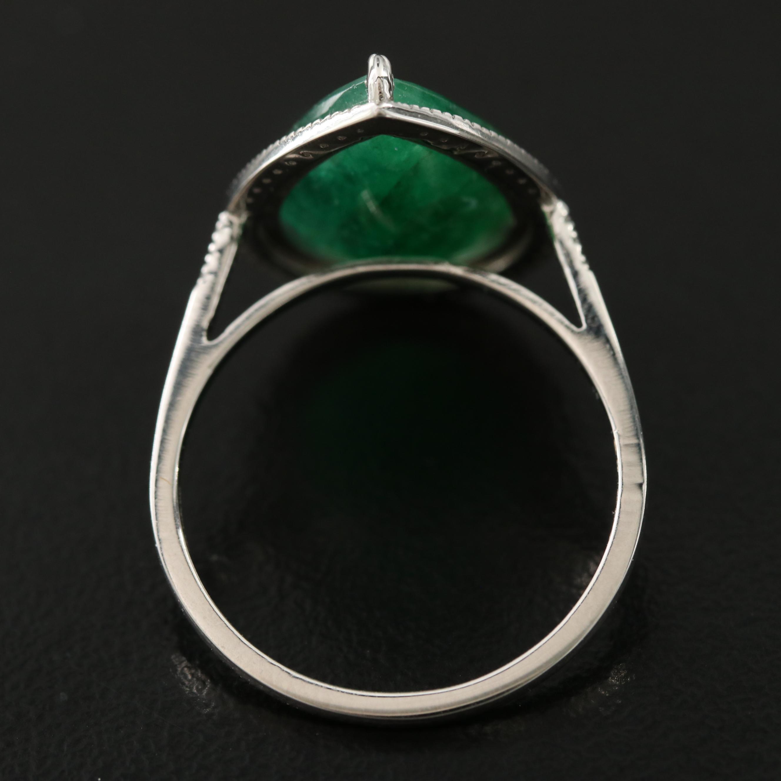 Platinum 4.95 CT Emerald and 0.16 CTW Diamond Ring