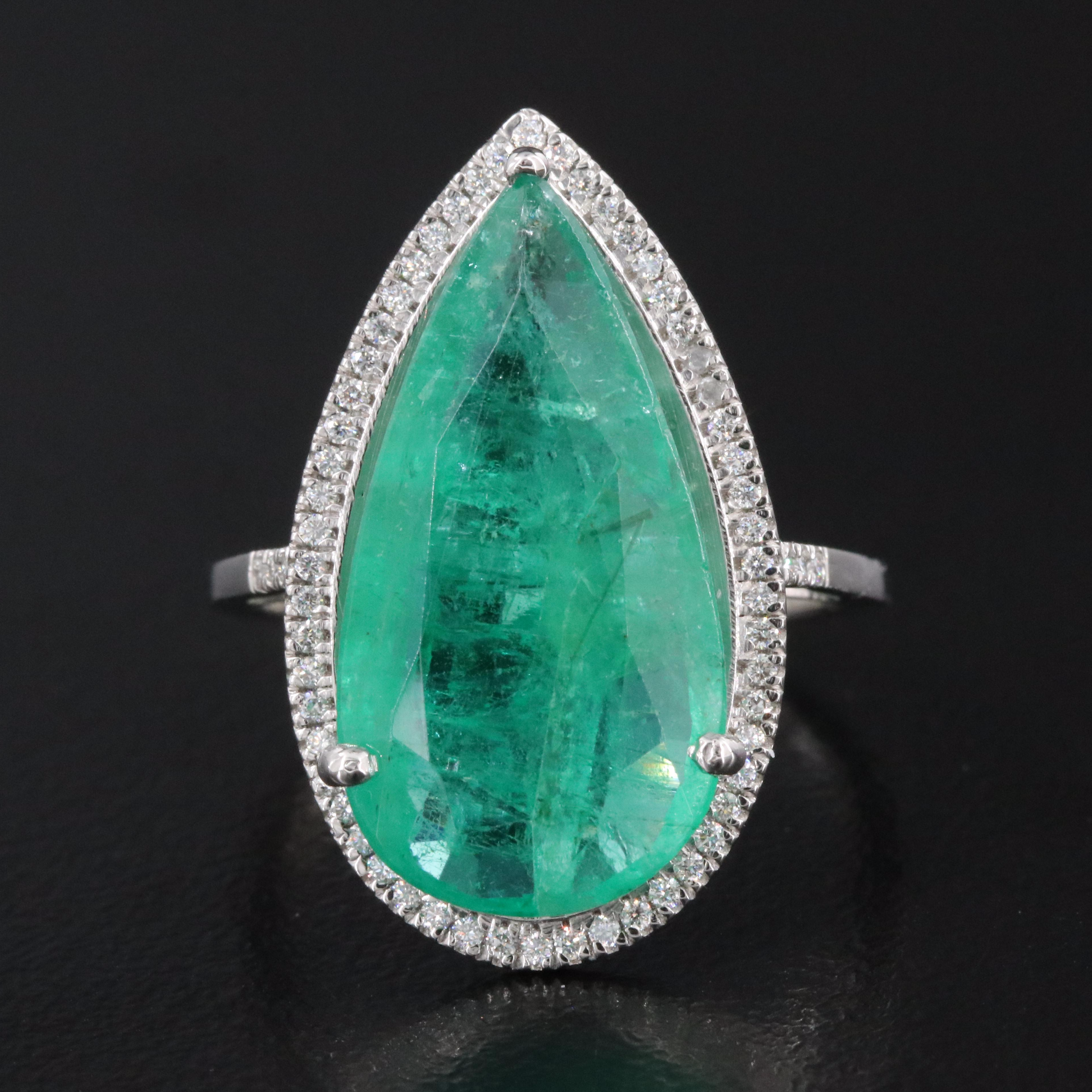 Platinum 6.76 CT Emerald and 0.19 CTW Diamond Ring