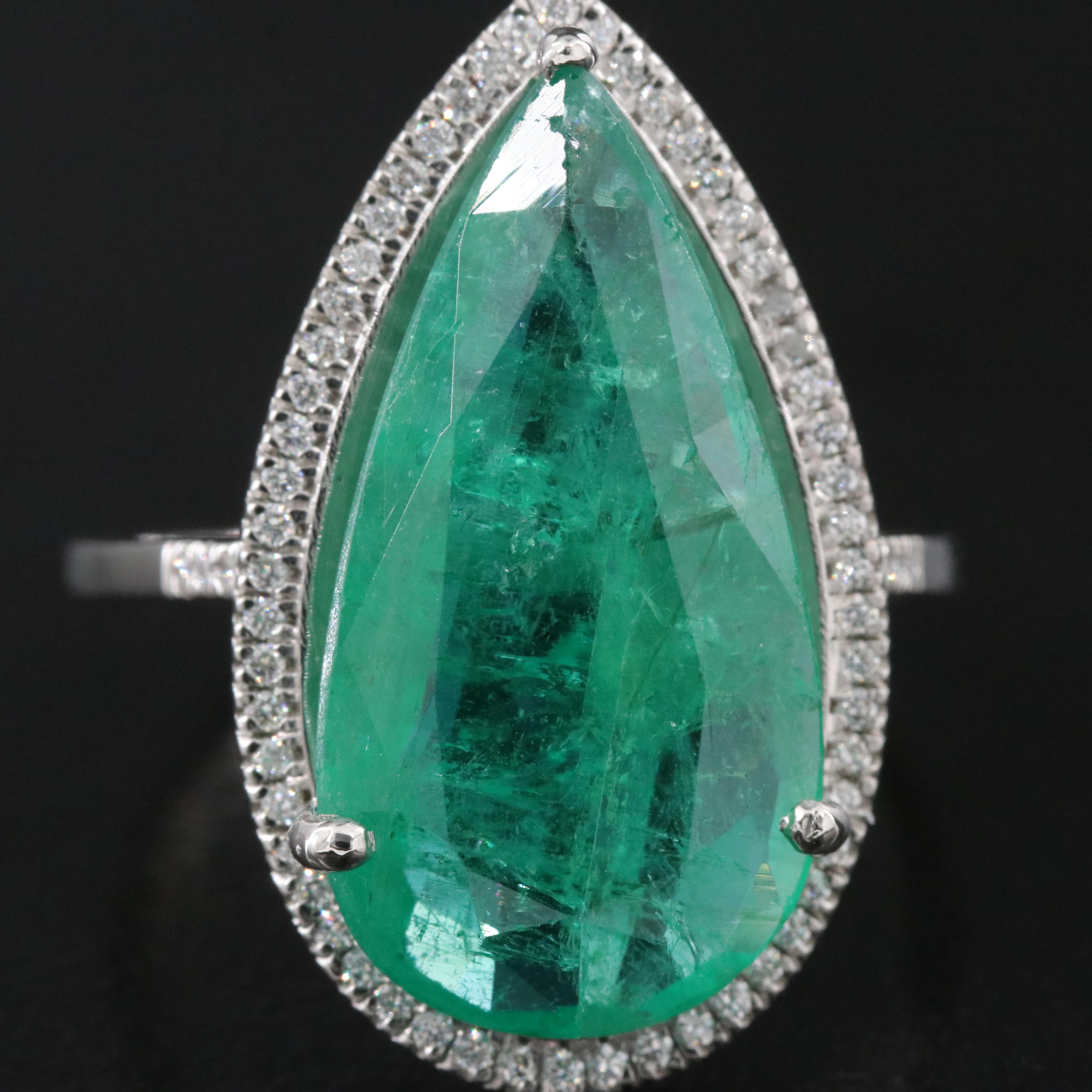 Platinum 6.76 CT Emerald and 0.19 CTW Diamond Ring