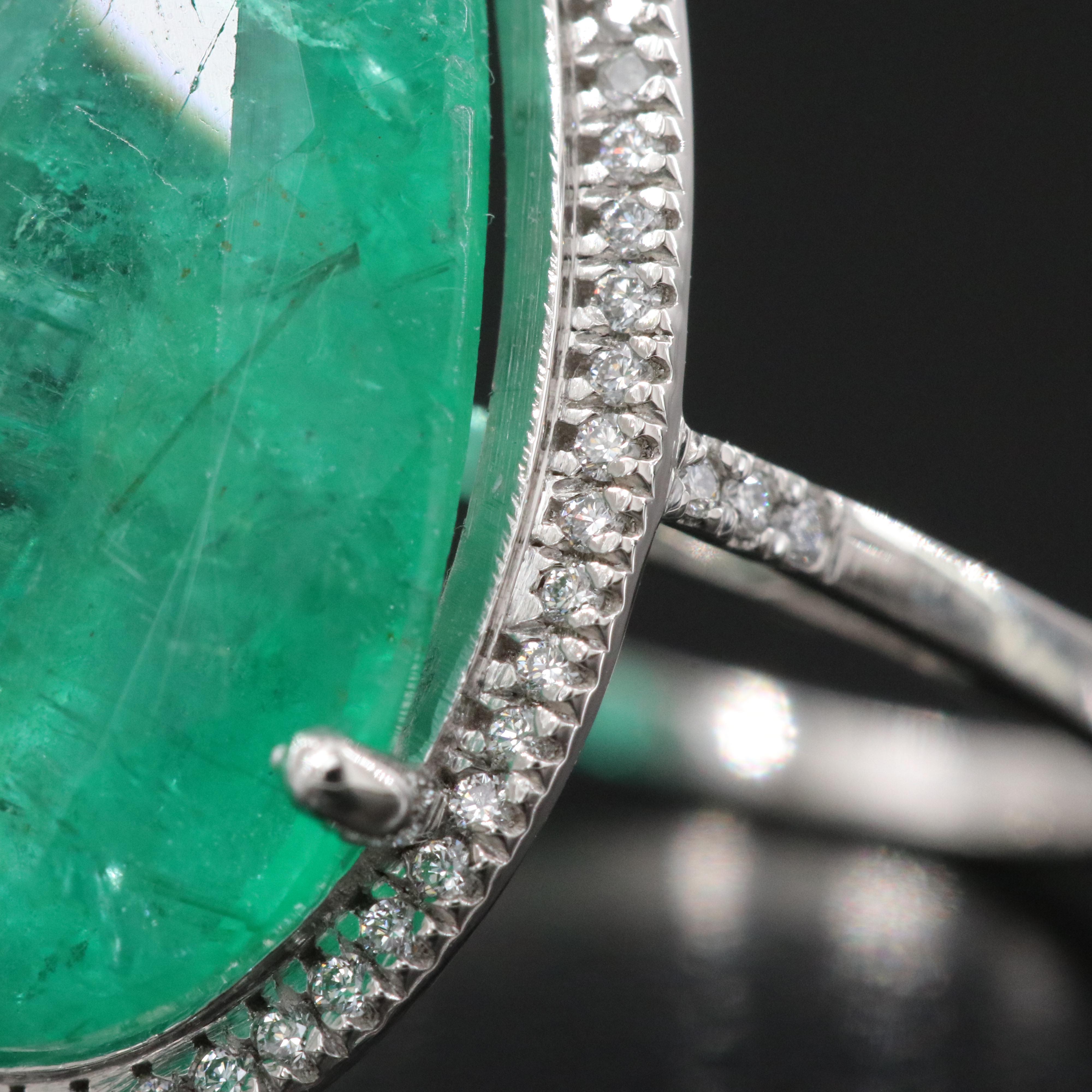 Platinum 6.76 CT Emerald and 0.19 CTW Diamond Ring