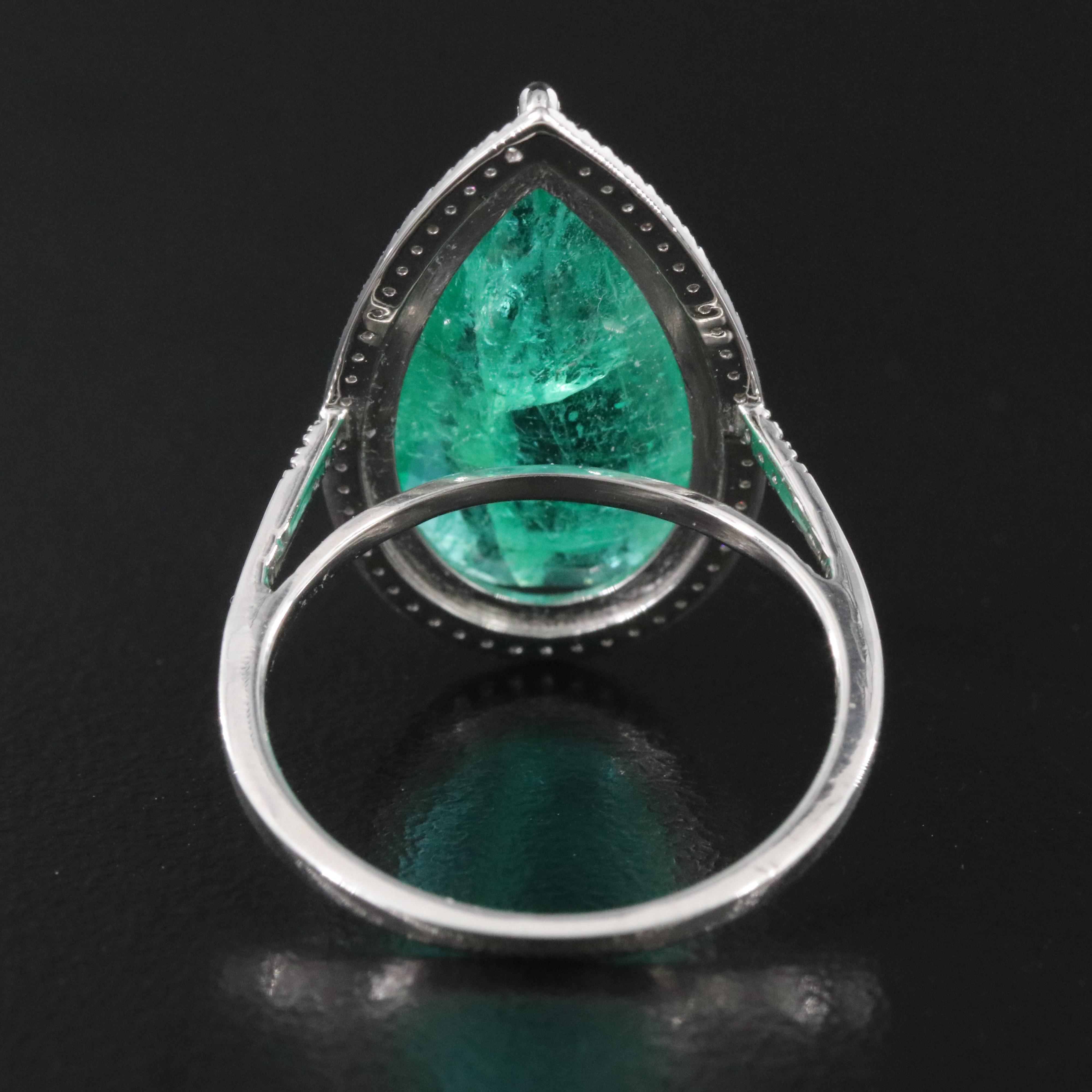Platinum 6.76 CT Emerald and 0.19 CTW Diamond Ring