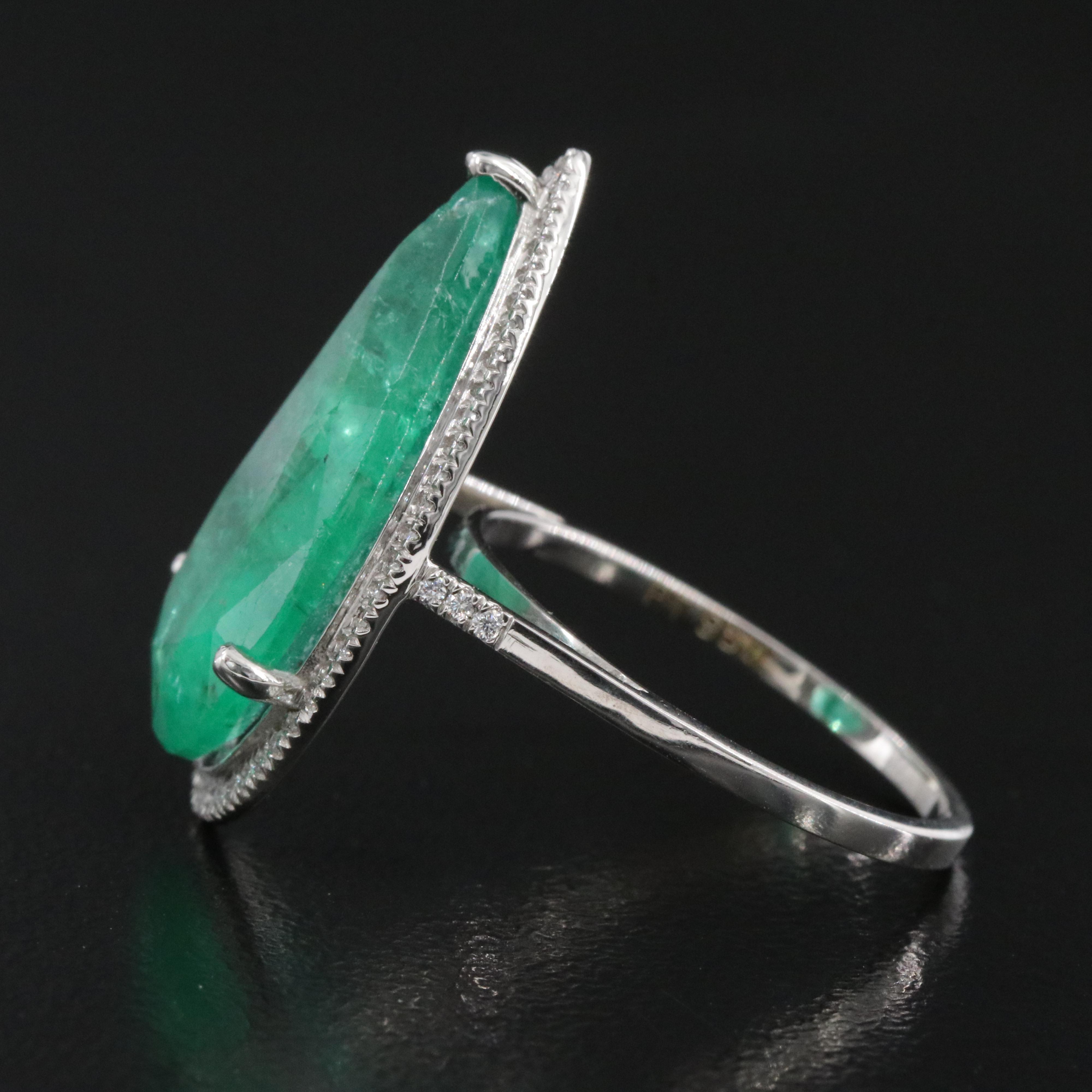 Platinum 6.76 CT Emerald and 0.19 CTW Diamond Ring