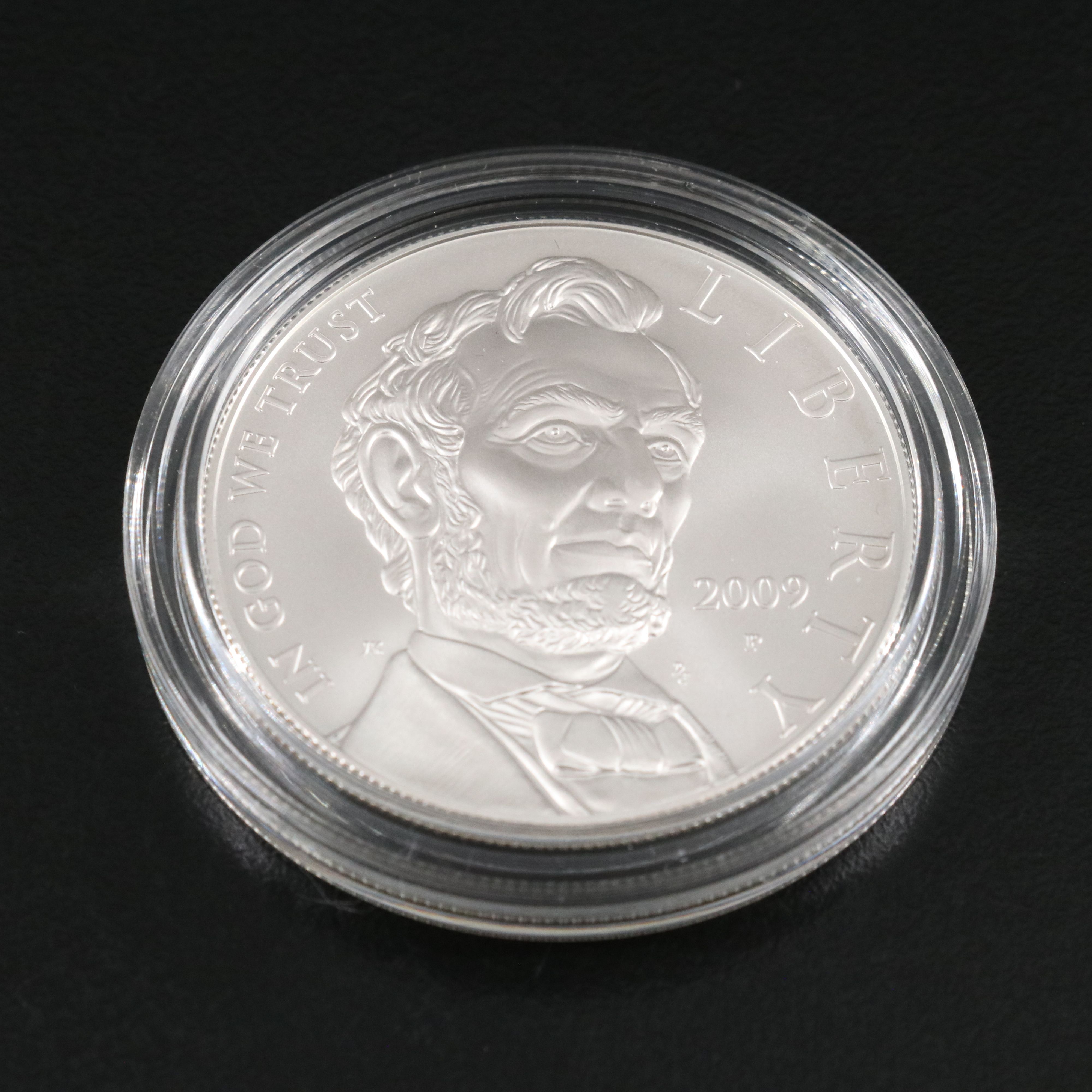 Three Modern Half Dollar and Dollar Commemorative Coins
