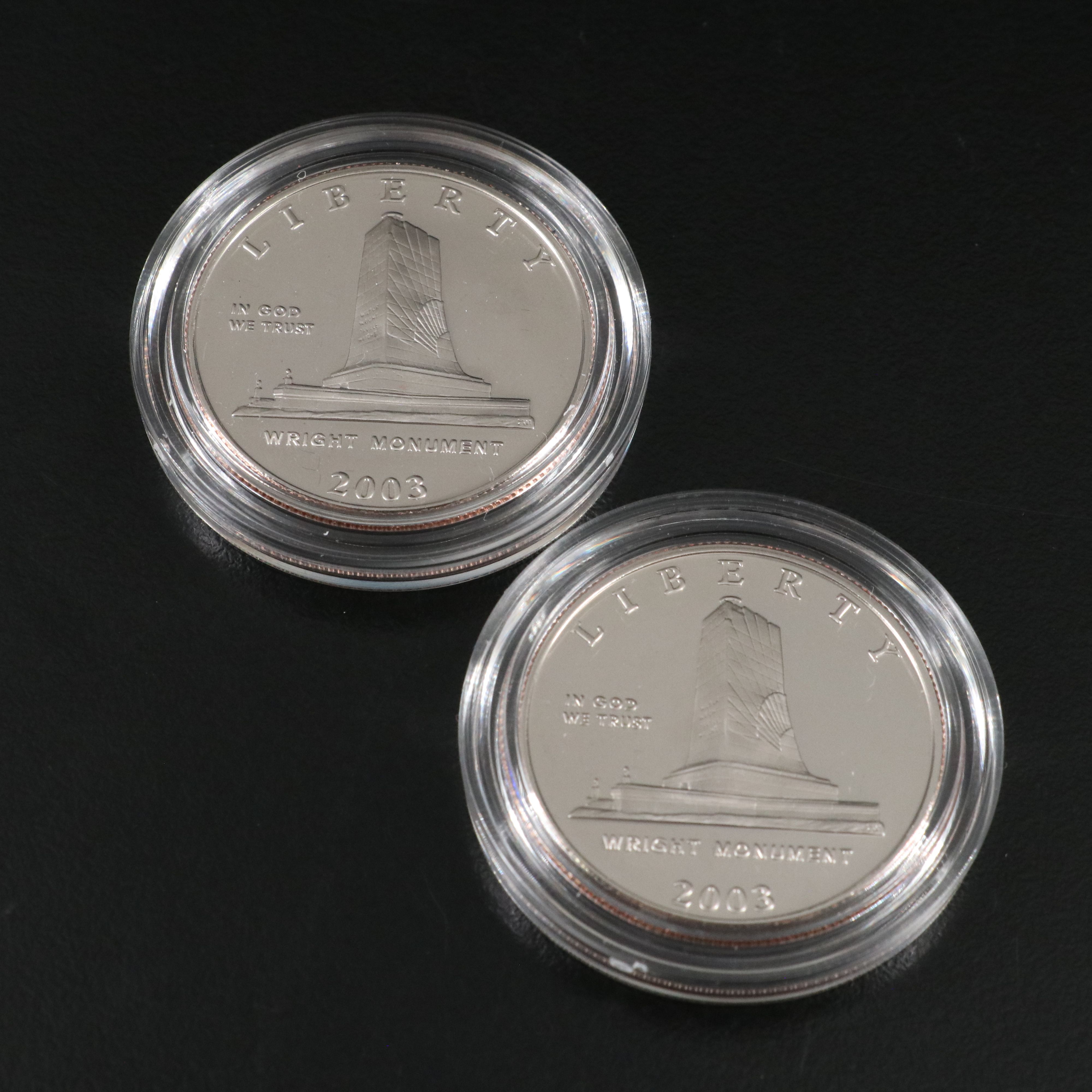 Three Modern Half Dollar and Dollar Commemorative Coins