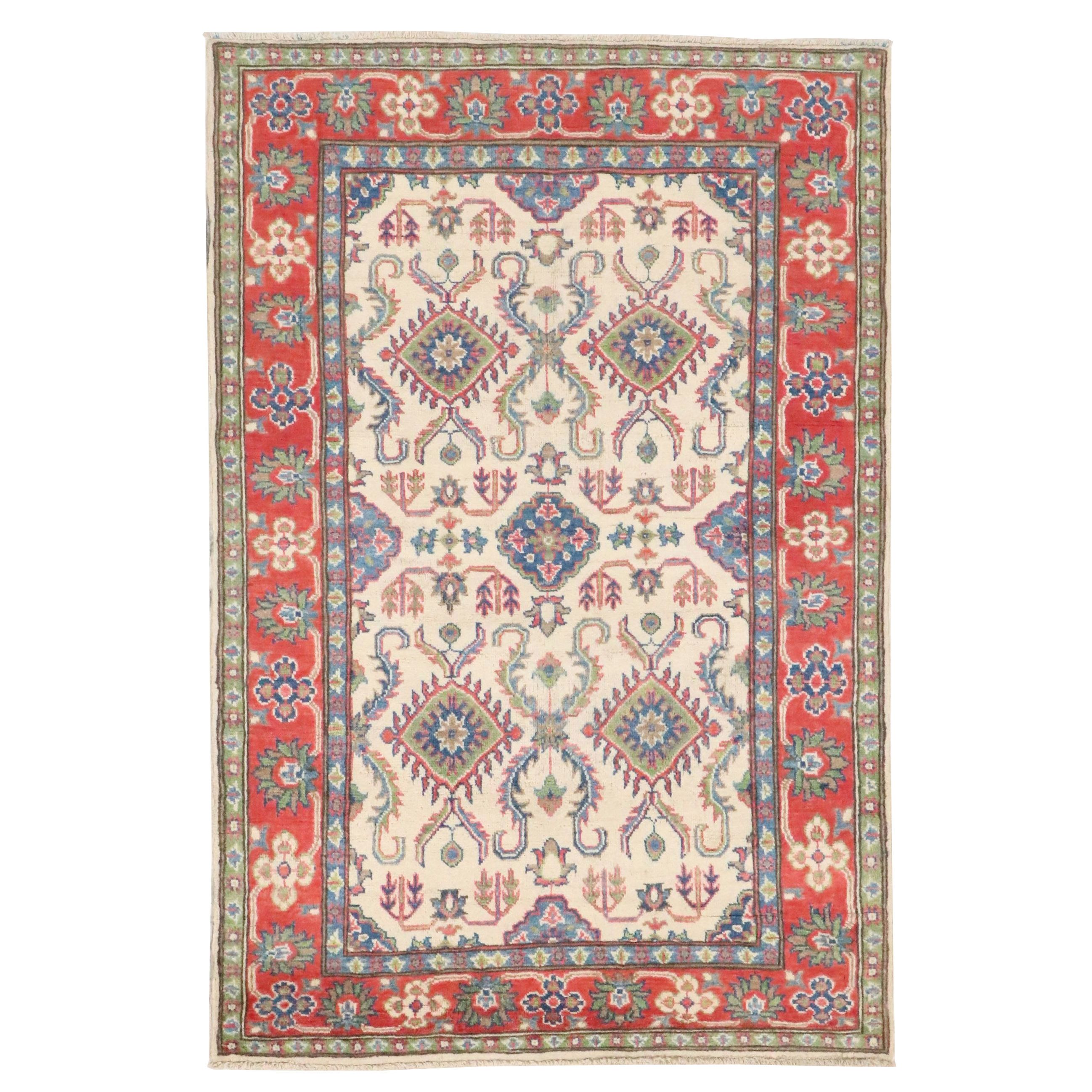 4'1 x 6' Hand-Knotted Pakistani Kazak Area Rug