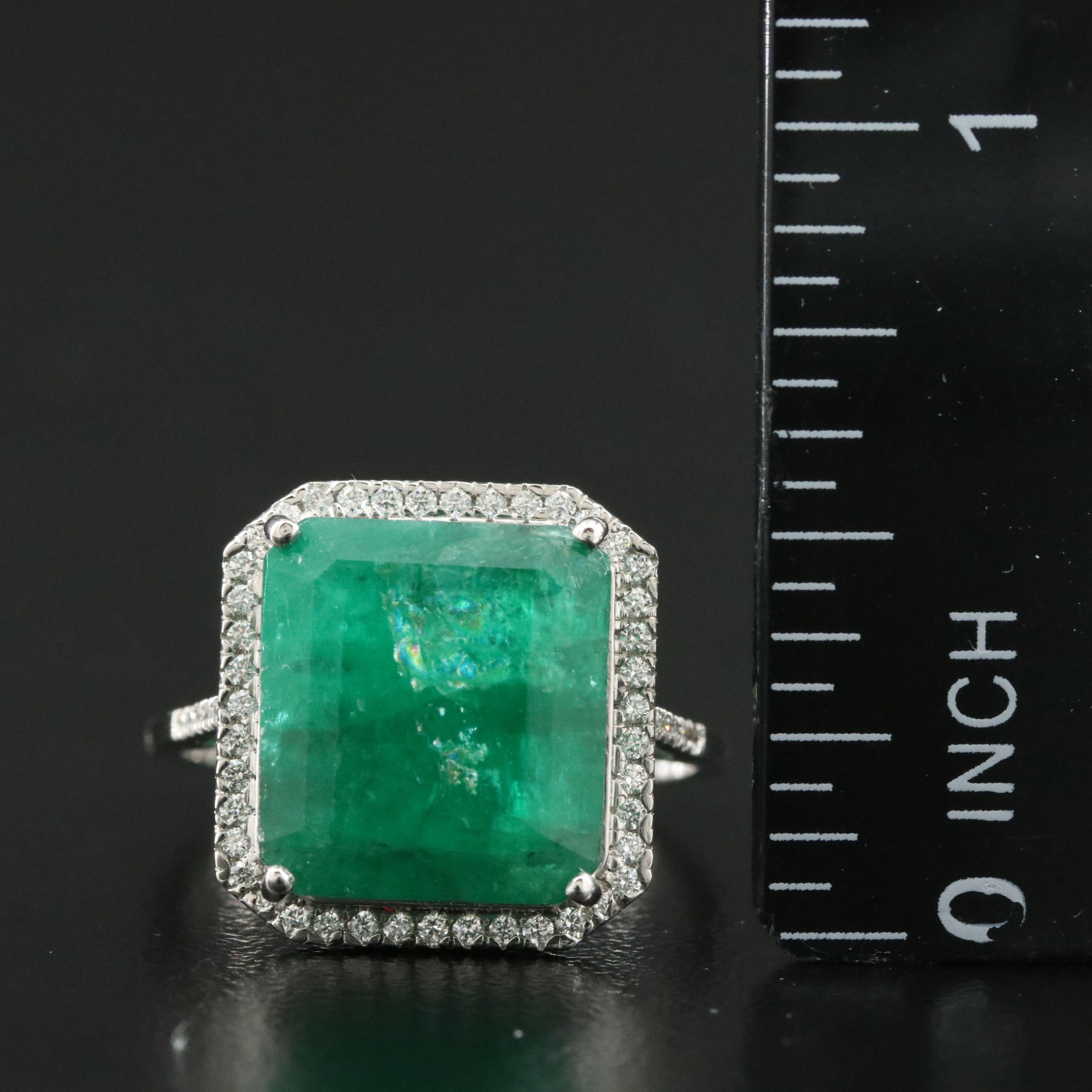 Platinum 3.71 CT Emerald and 0.20 CTW Diamond Ring