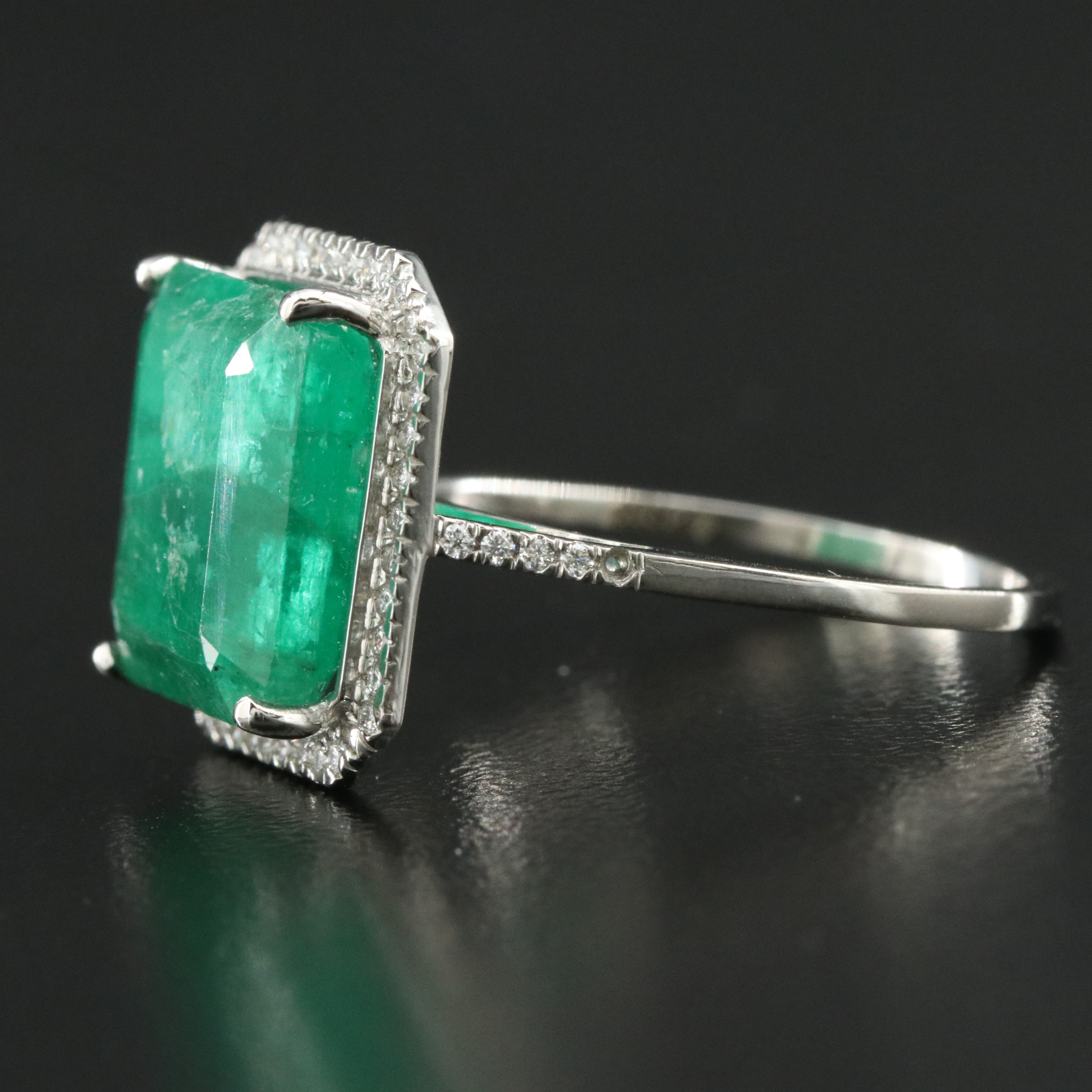 Platinum 3.71 CT Emerald and 0.20 CTW Diamond Ring