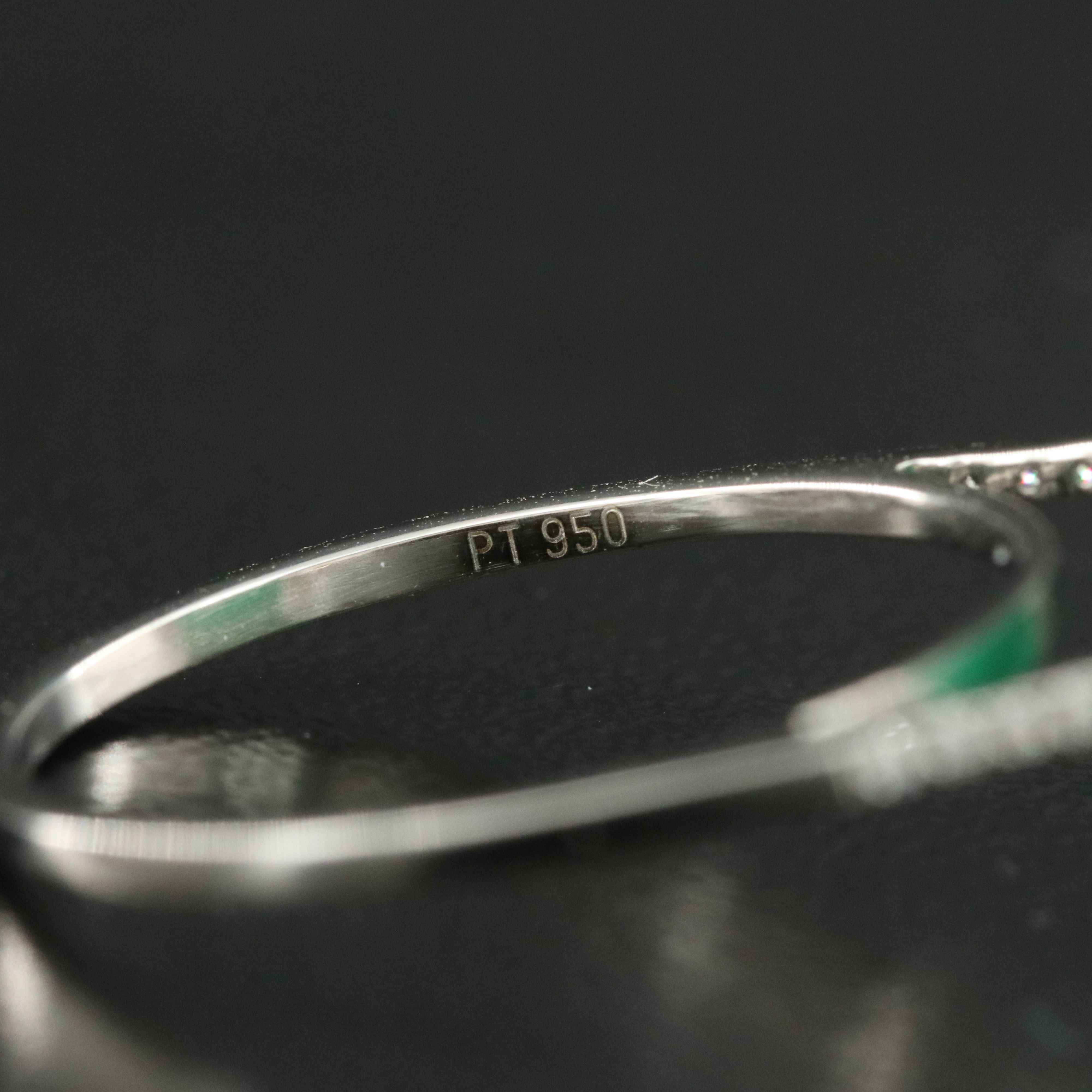 Platinum 3.71 CT Emerald and 0.20 CTW Diamond Ring