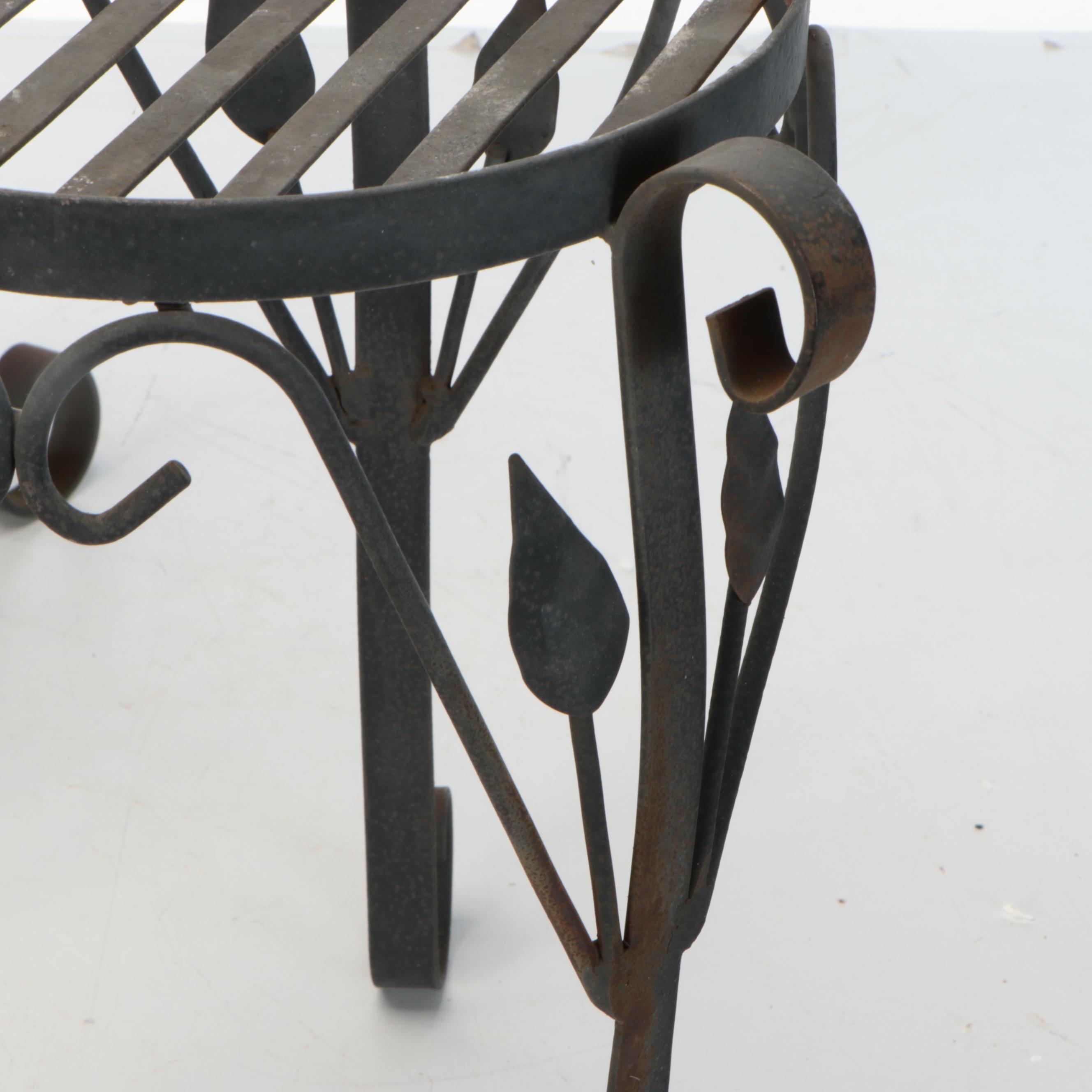 Pair of Wrought Iron Plant Stands with Cast Concrete Garden Statues