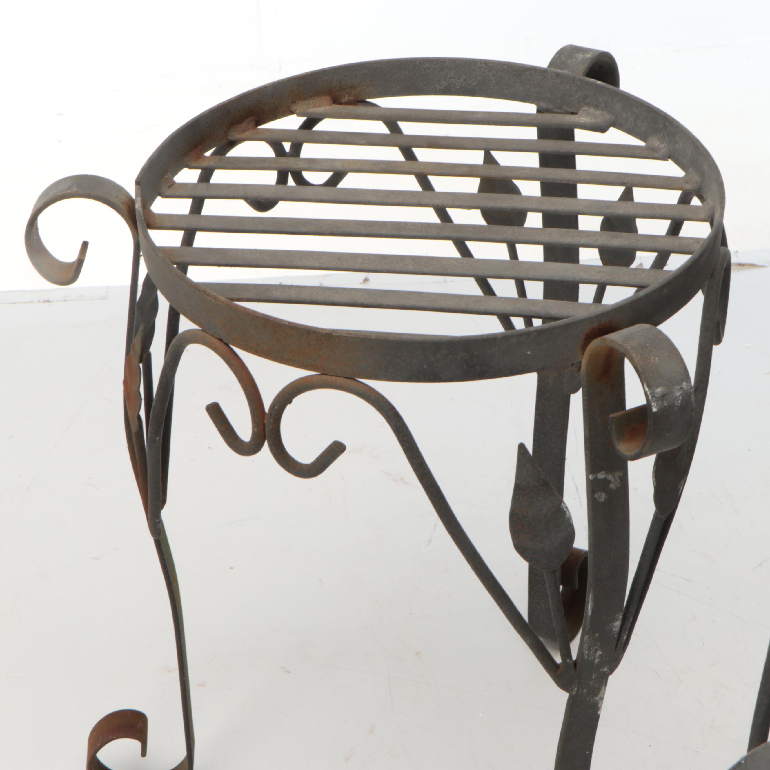 Pair of Wrought Iron Plant Stands with Cast Concrete Garden Statues