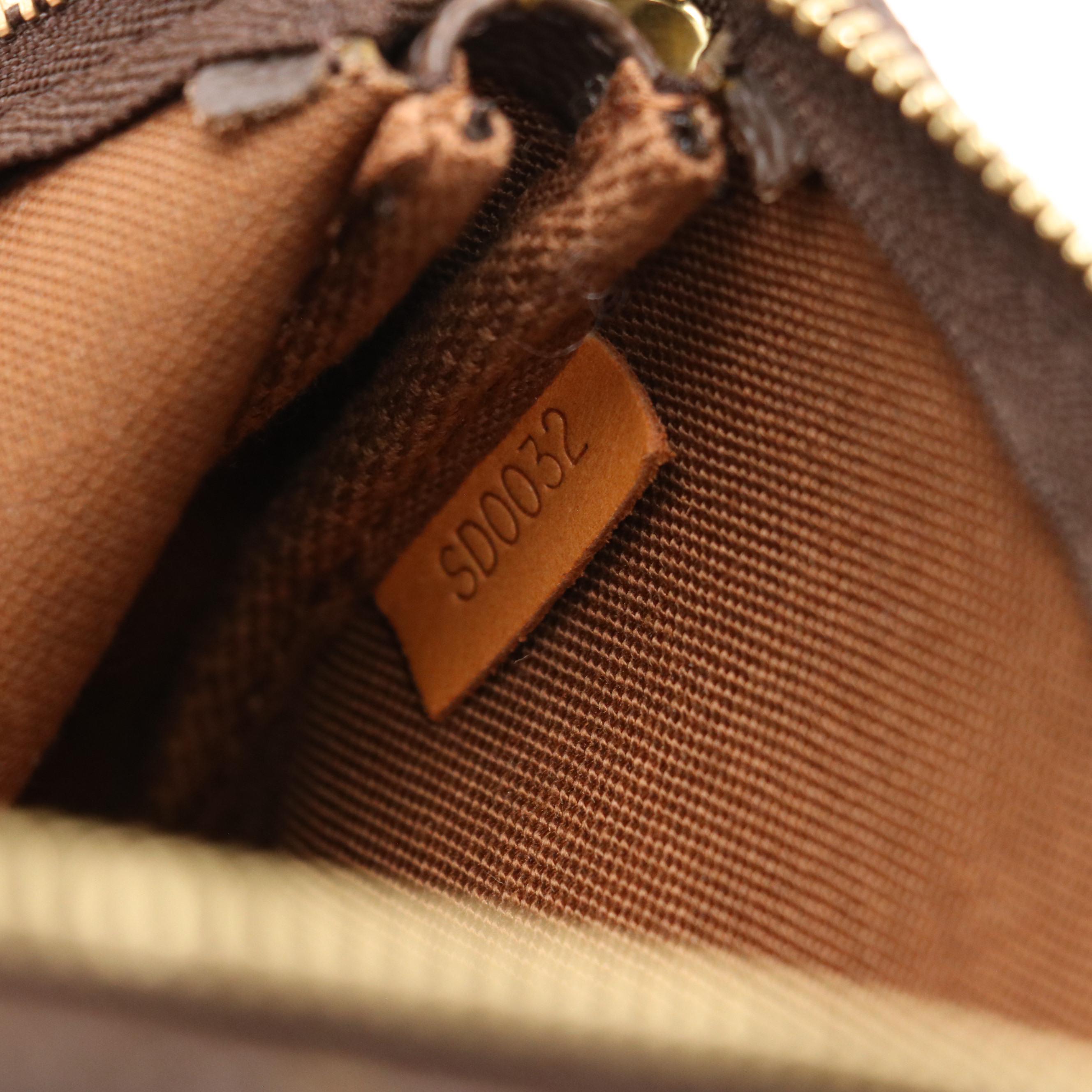 Louis Vuitton Mini Pochette Accessoires in Monogram Canvas with Chain Strap