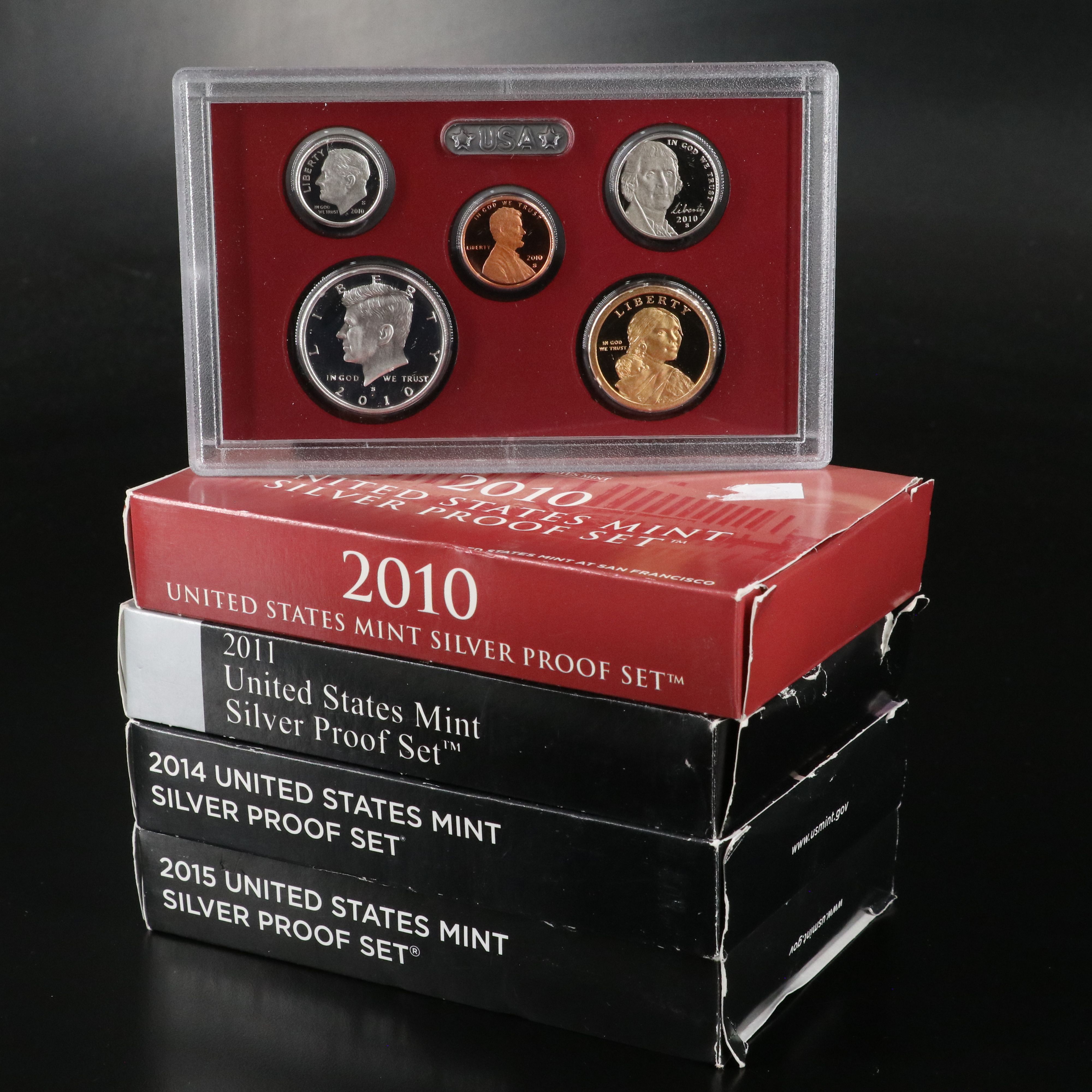 Four United States Modern Silver Proof Sets: 2010, 2011, 2014, and 2015