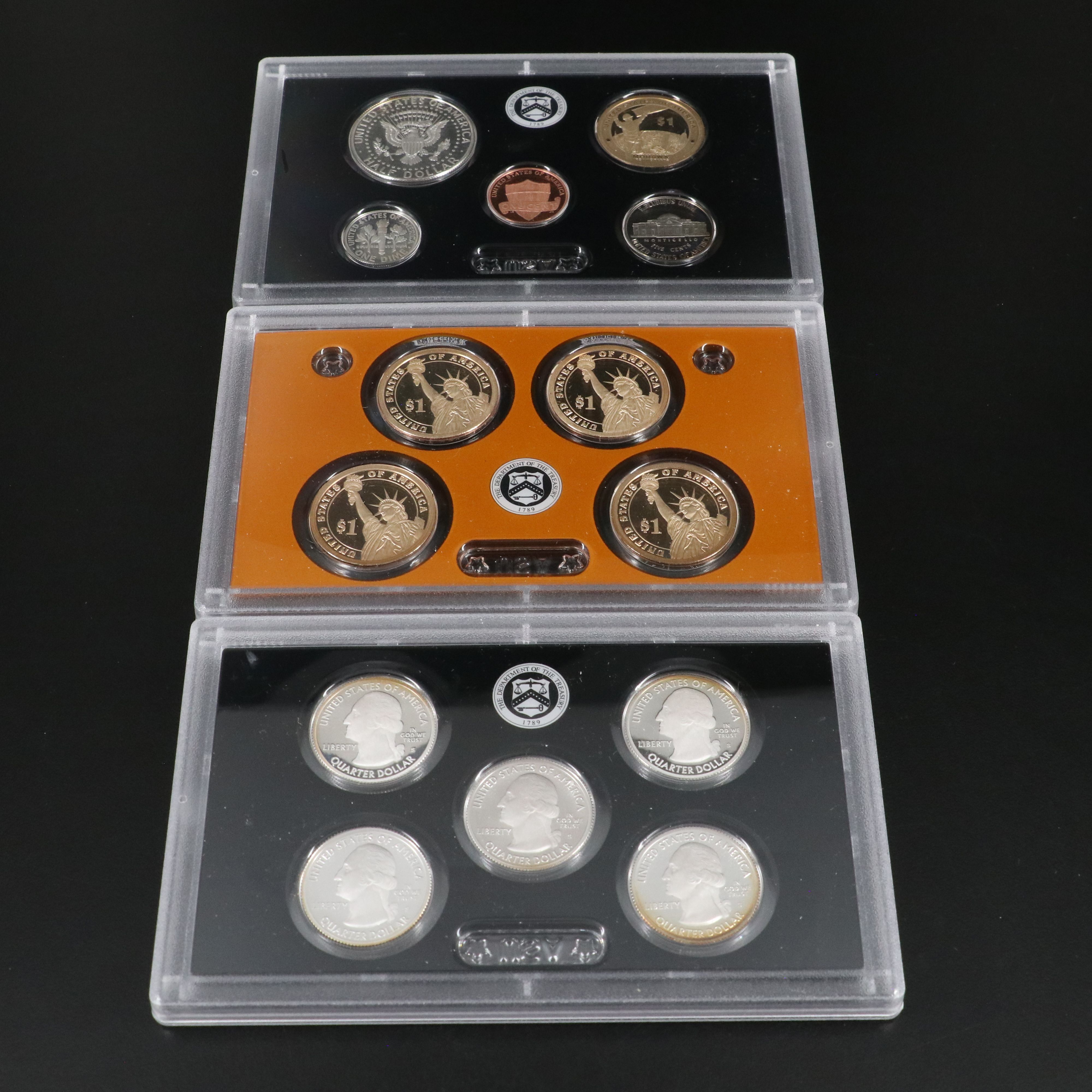 Four United States Modern Silver Proof Sets: 2010, 2011, 2014, and 2015