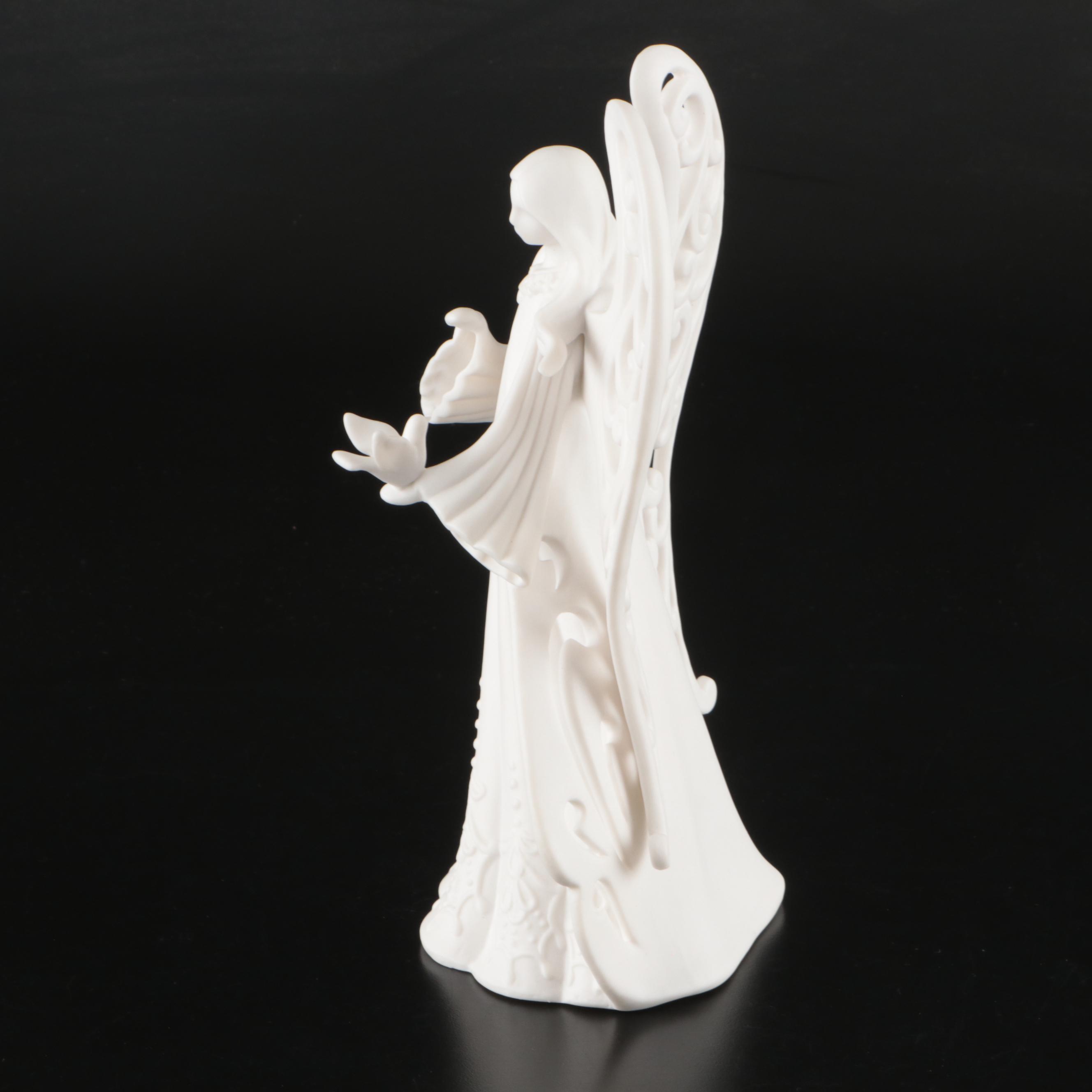 Ceramic and Wooden Angel Figurines