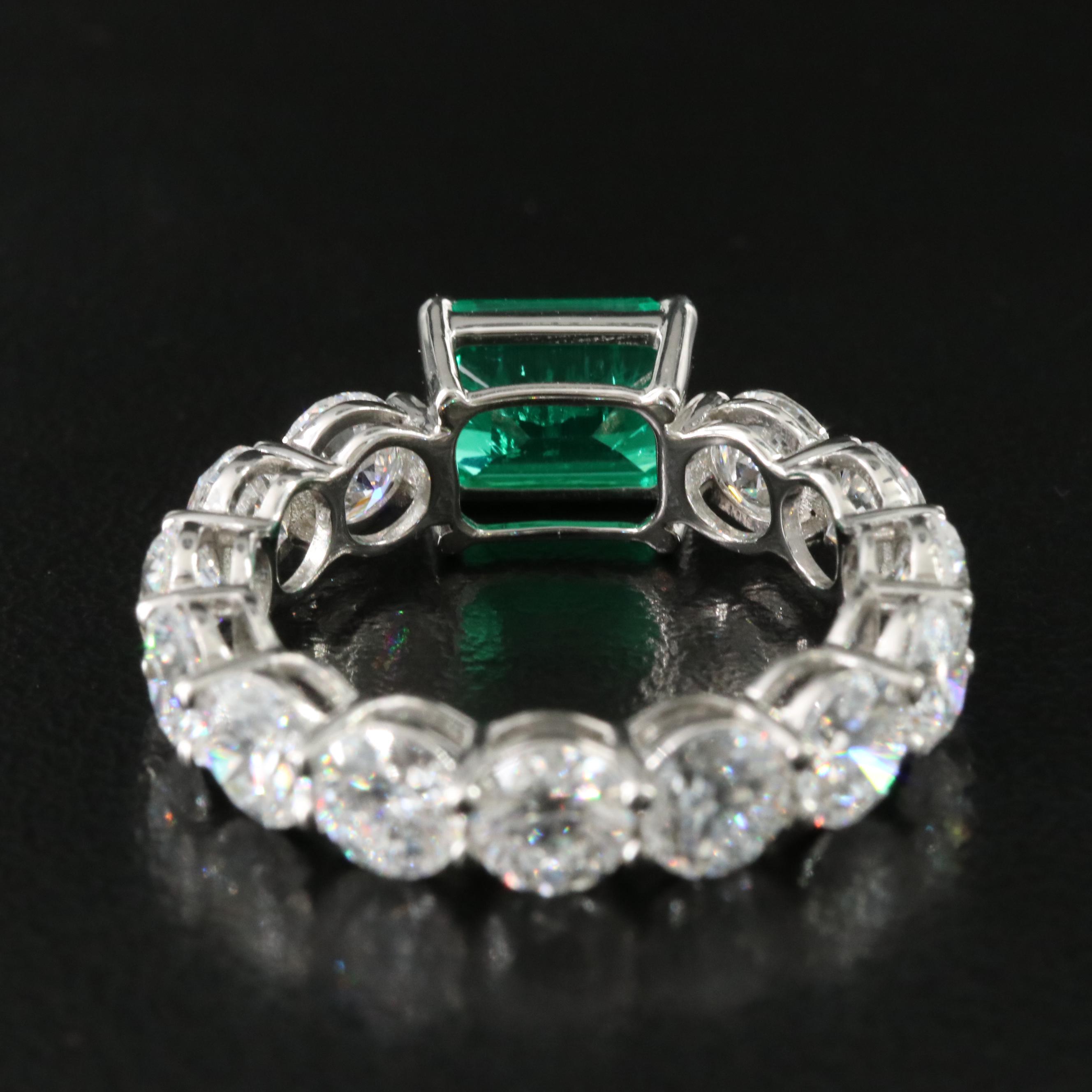 Platinum 1.31 CT Emerald and 4.23 CTW Lab Grown Diamond Eternity Band