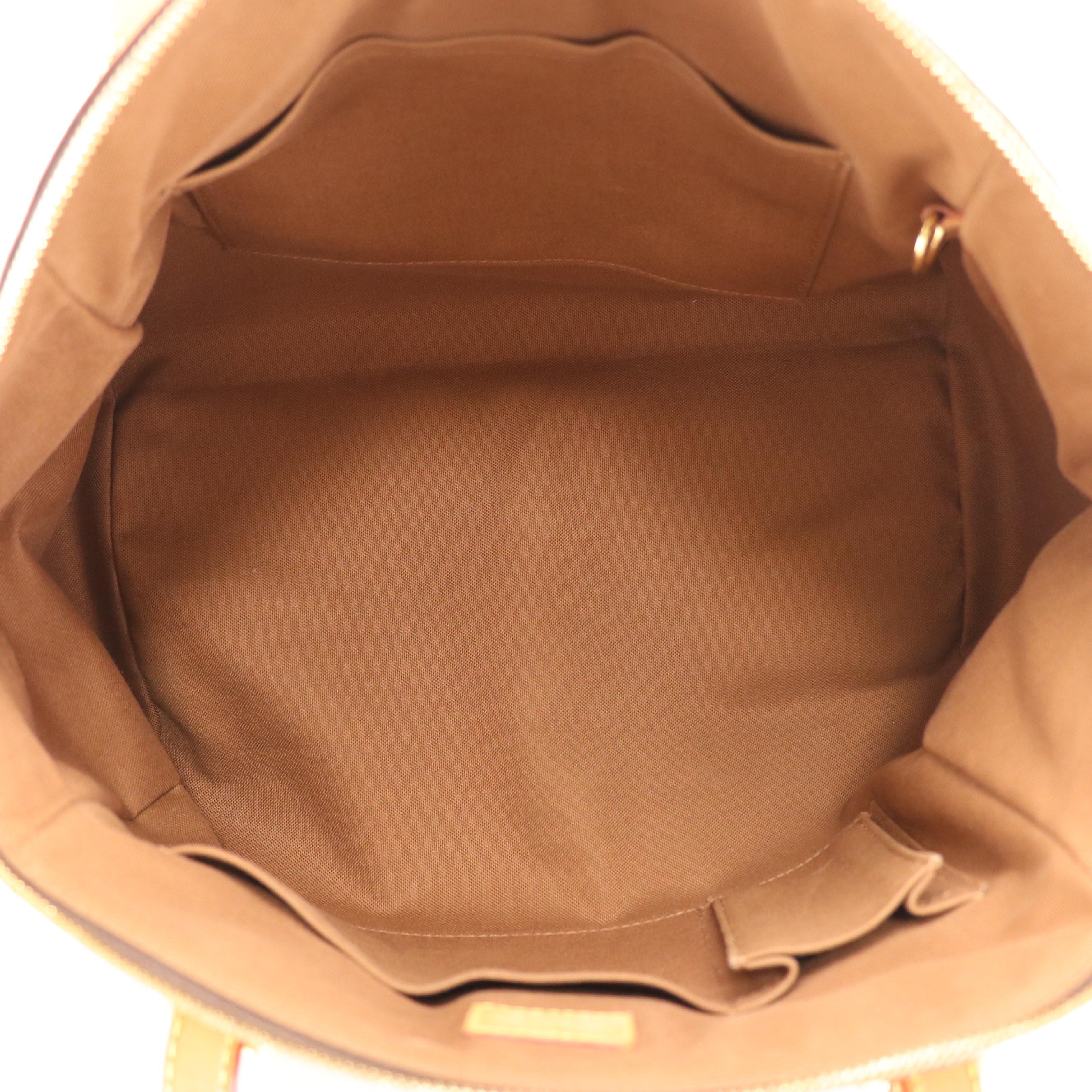 Louis Vuitton Tivoli PM Handbag in Monogram Canvas and Leather