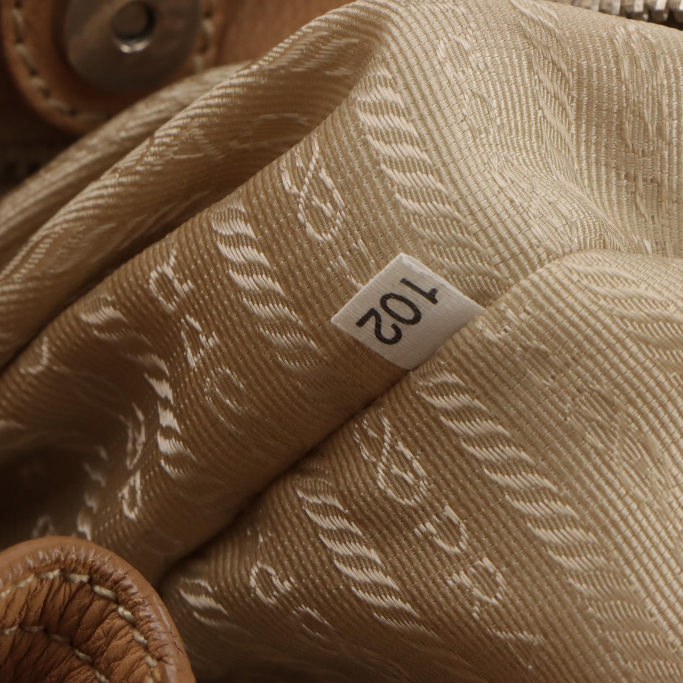 Prada Buckle Strap Tote Bag in Beige Pebble Grained Leather