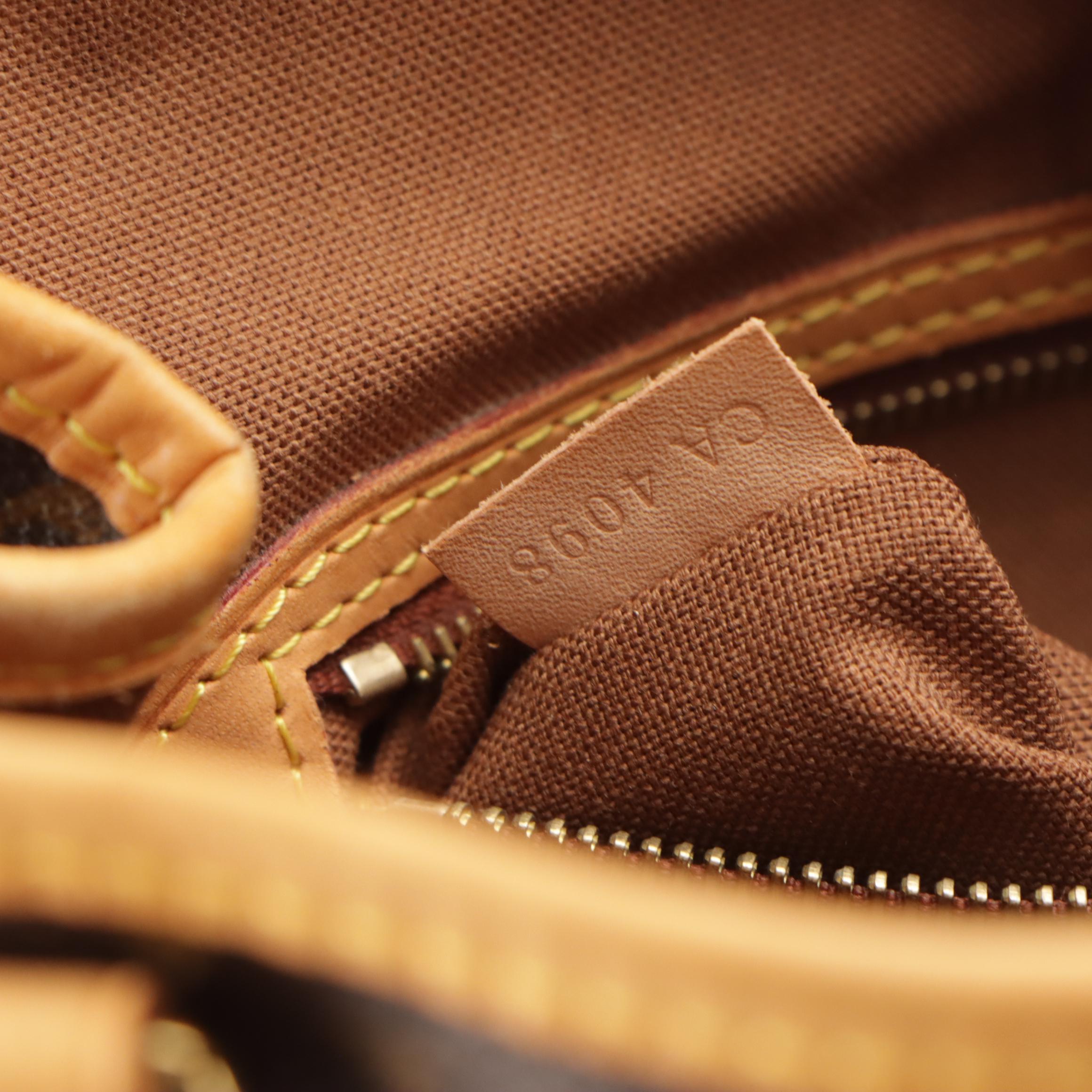 Louis Vuitton Batignolles Shoulder Bag in Monogram Canvas and Leather Trim