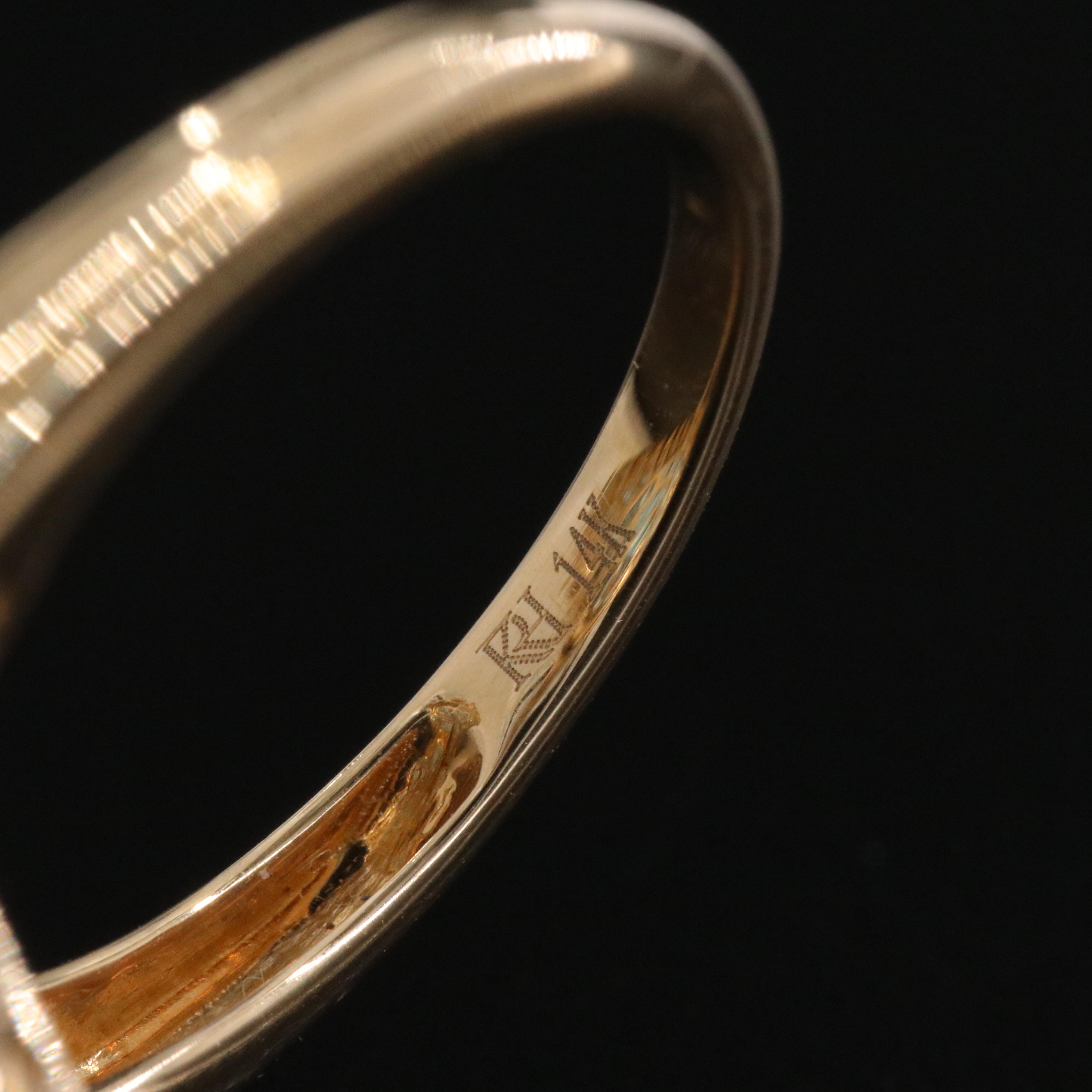 14K 13.92 CT Blue Topaz and 0.26 CTW Diamond Halo Ring