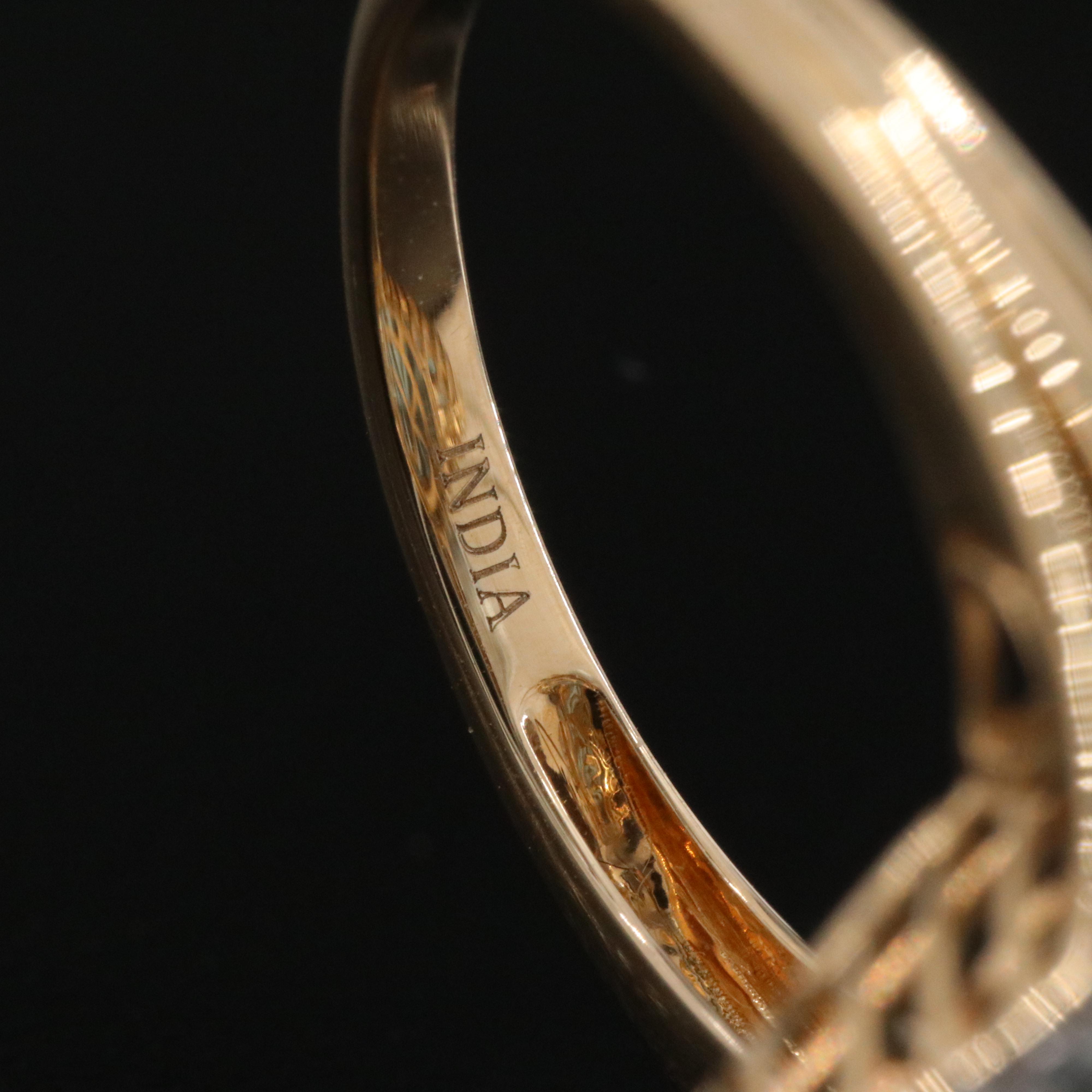 14K 13.92 CT Blue Topaz and 0.26 CTW Diamond Halo Ring