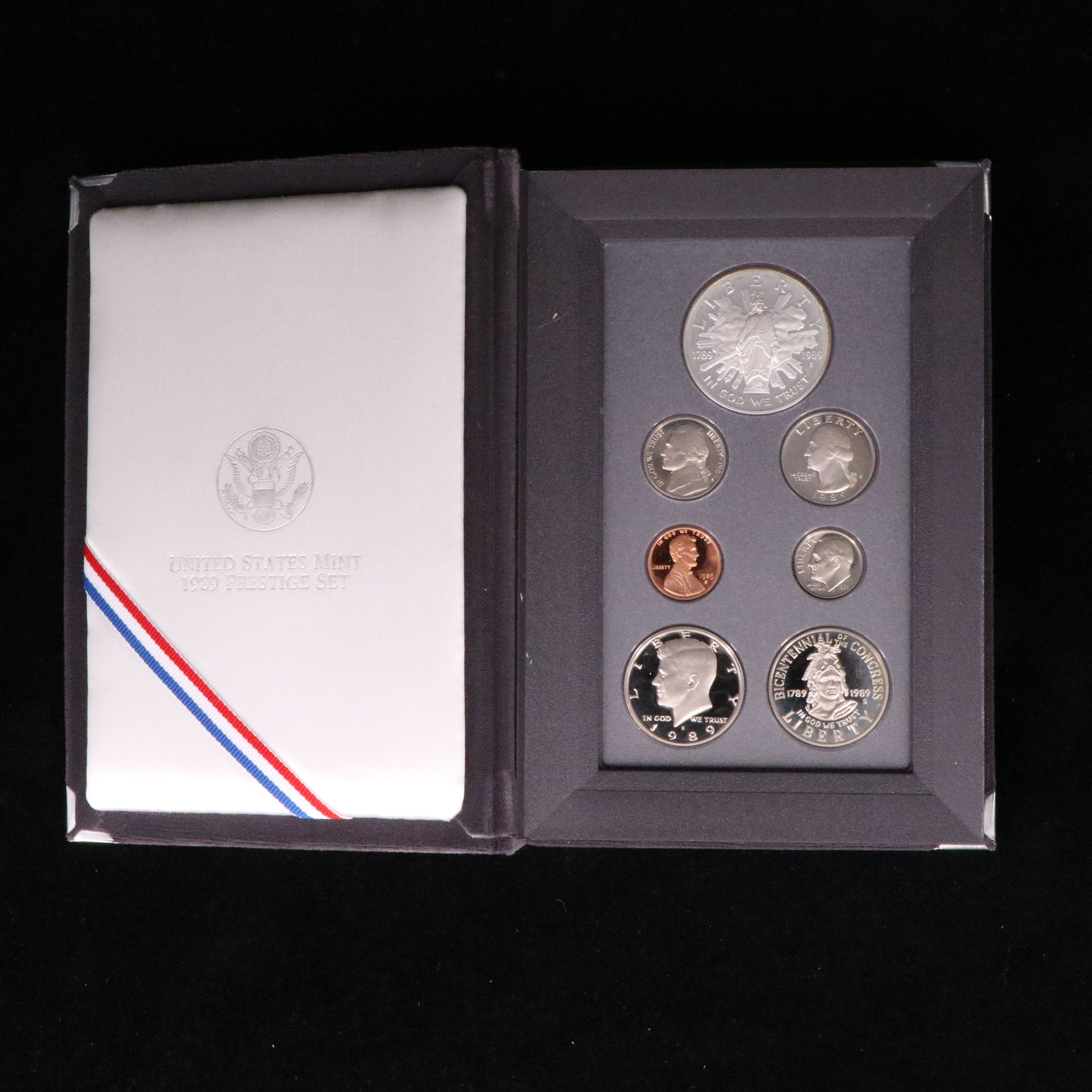 Three U.S. Mint Prestige Proof Sets, Including Silver Dollars