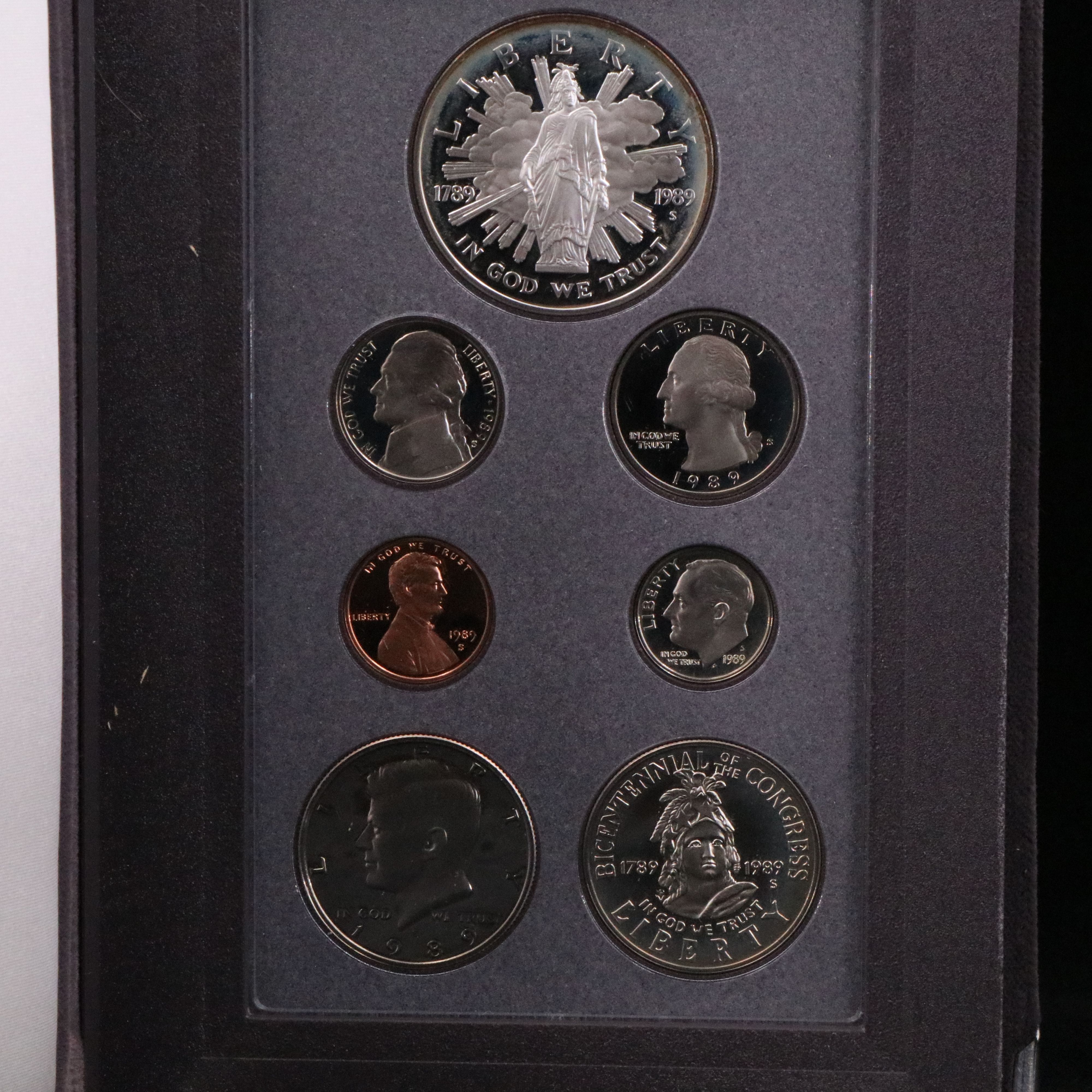 Three U.S. Mint Prestige Proof Sets, Including Silver Dollars