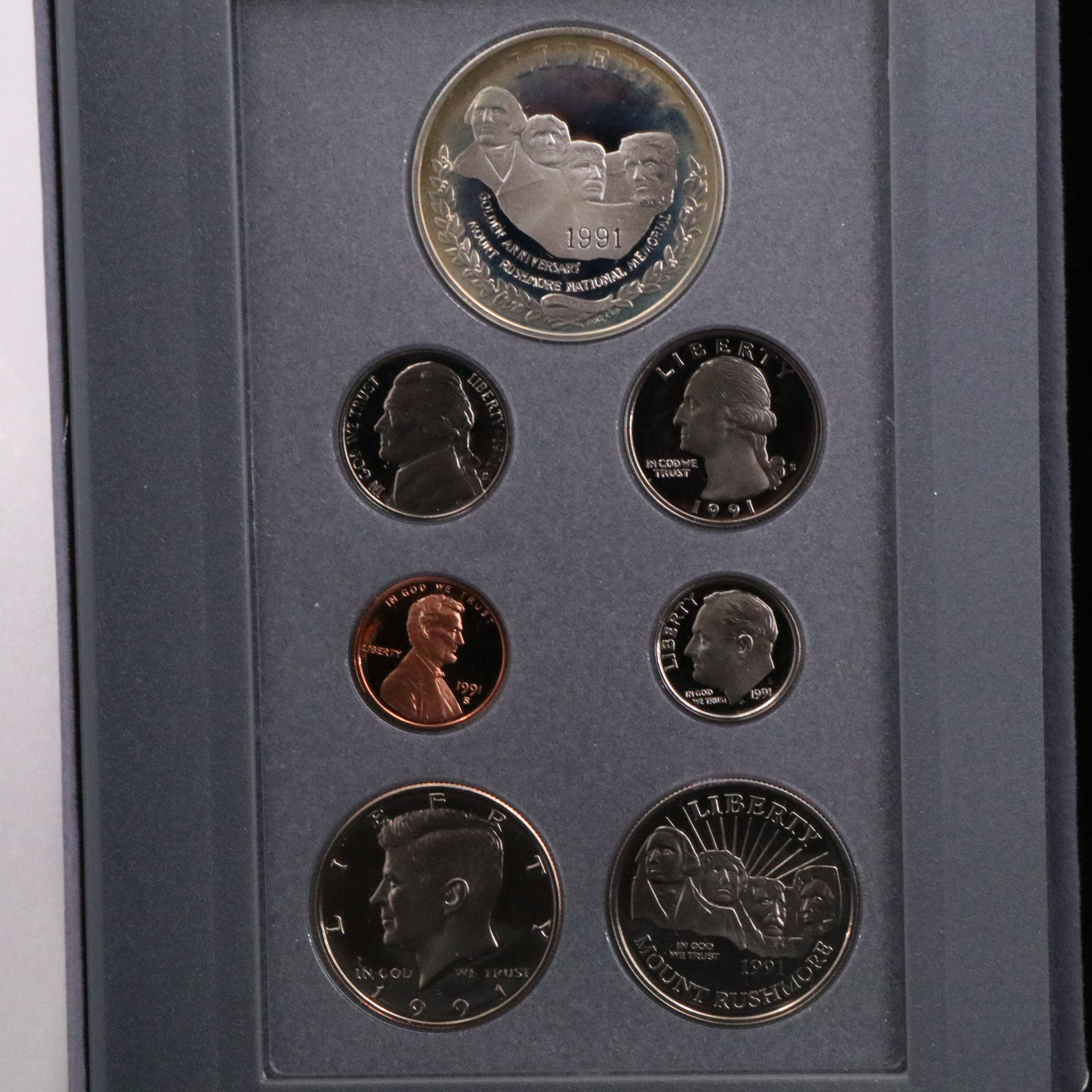 Three U.S. Mint Prestige Proof Sets, Including Silver Dollars