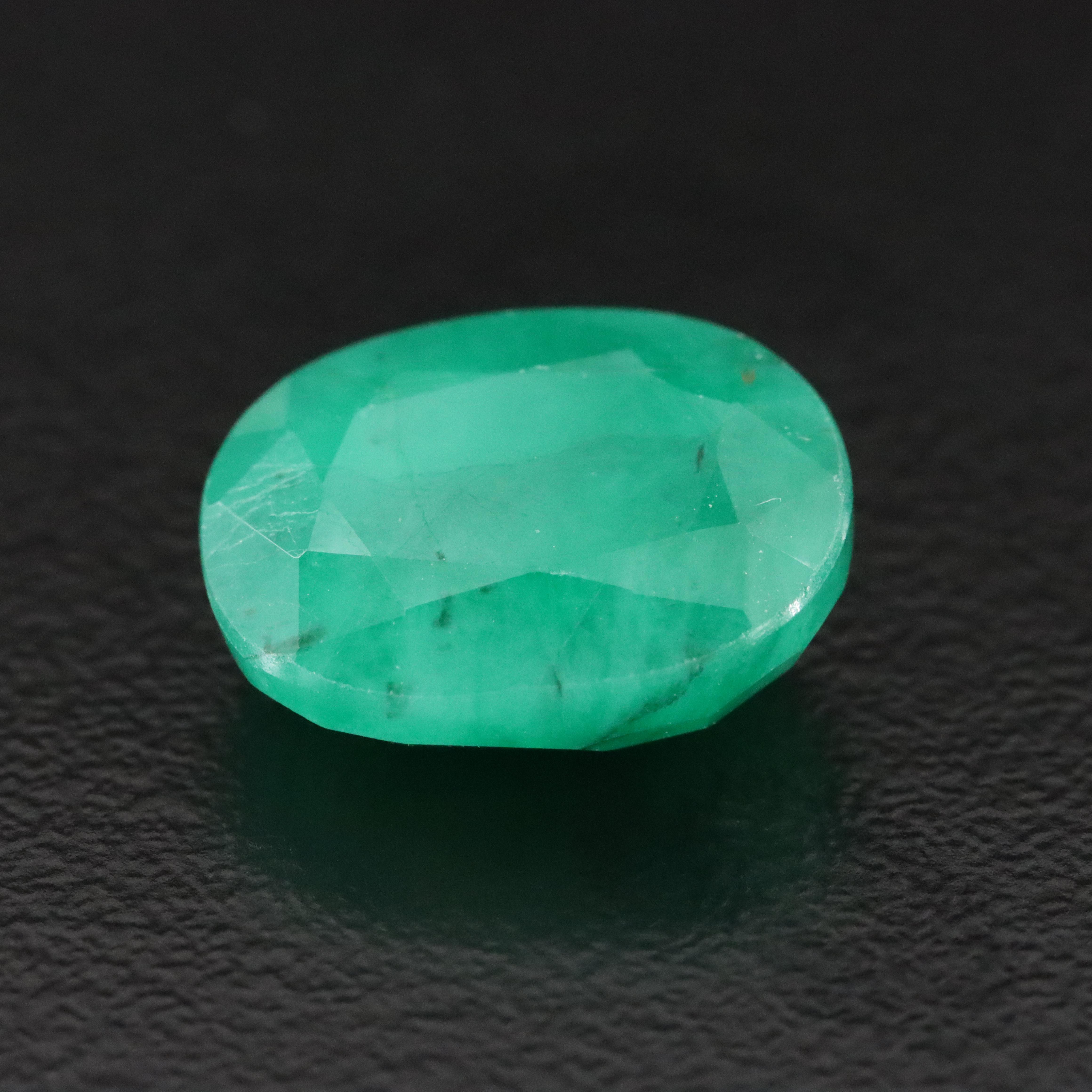 Loose 6.40 CT Emerald with IGI Report