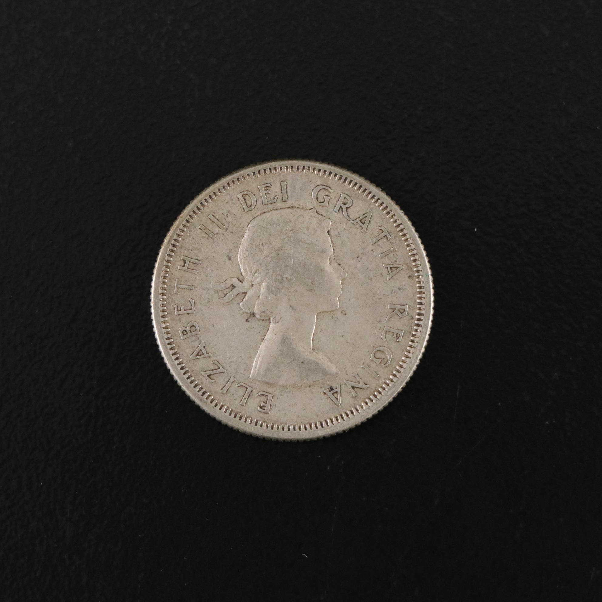 Twenty Washington Silver Quarters with One Canadian Silver Quarter