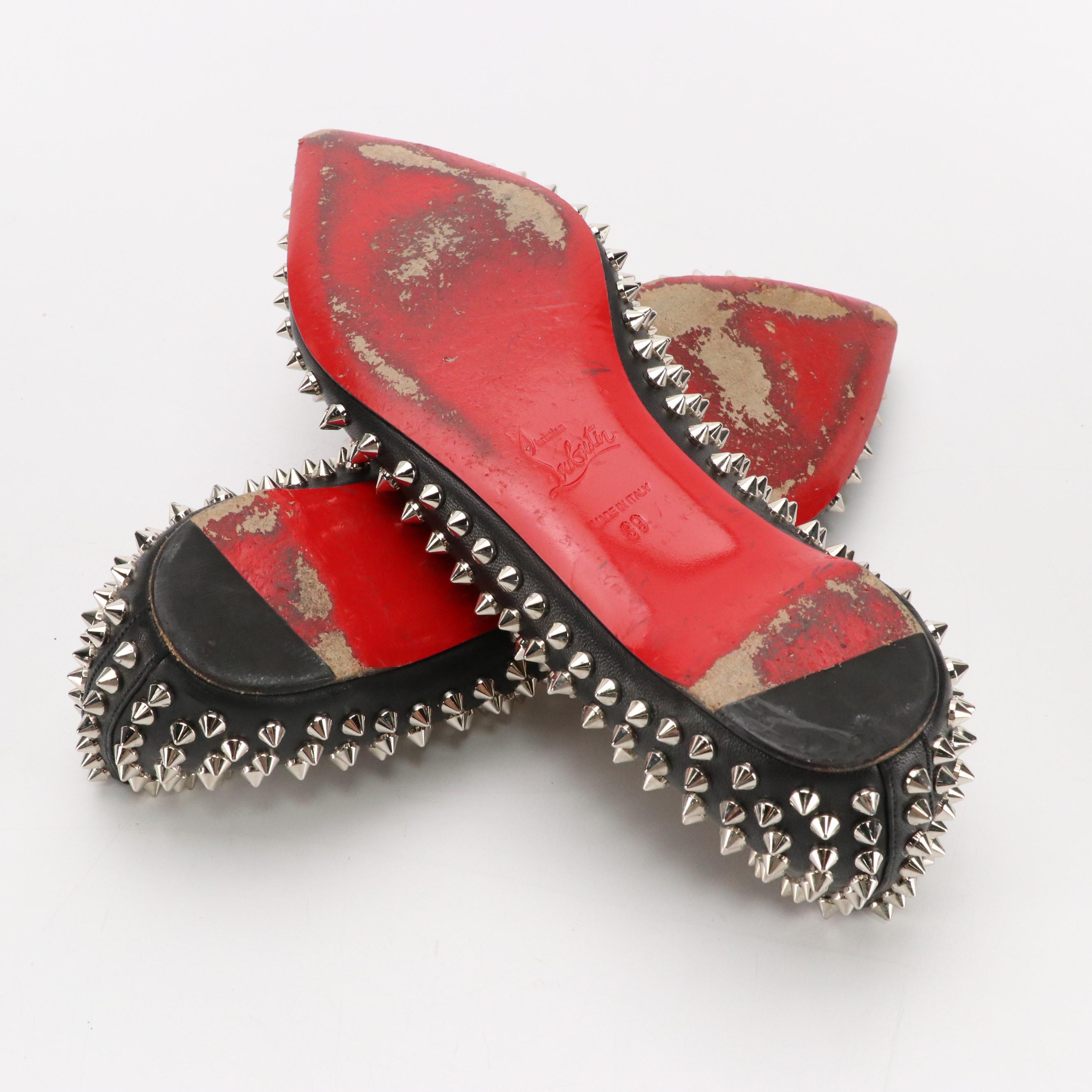 Christian Louboutin Spiked Flats in Black Leather