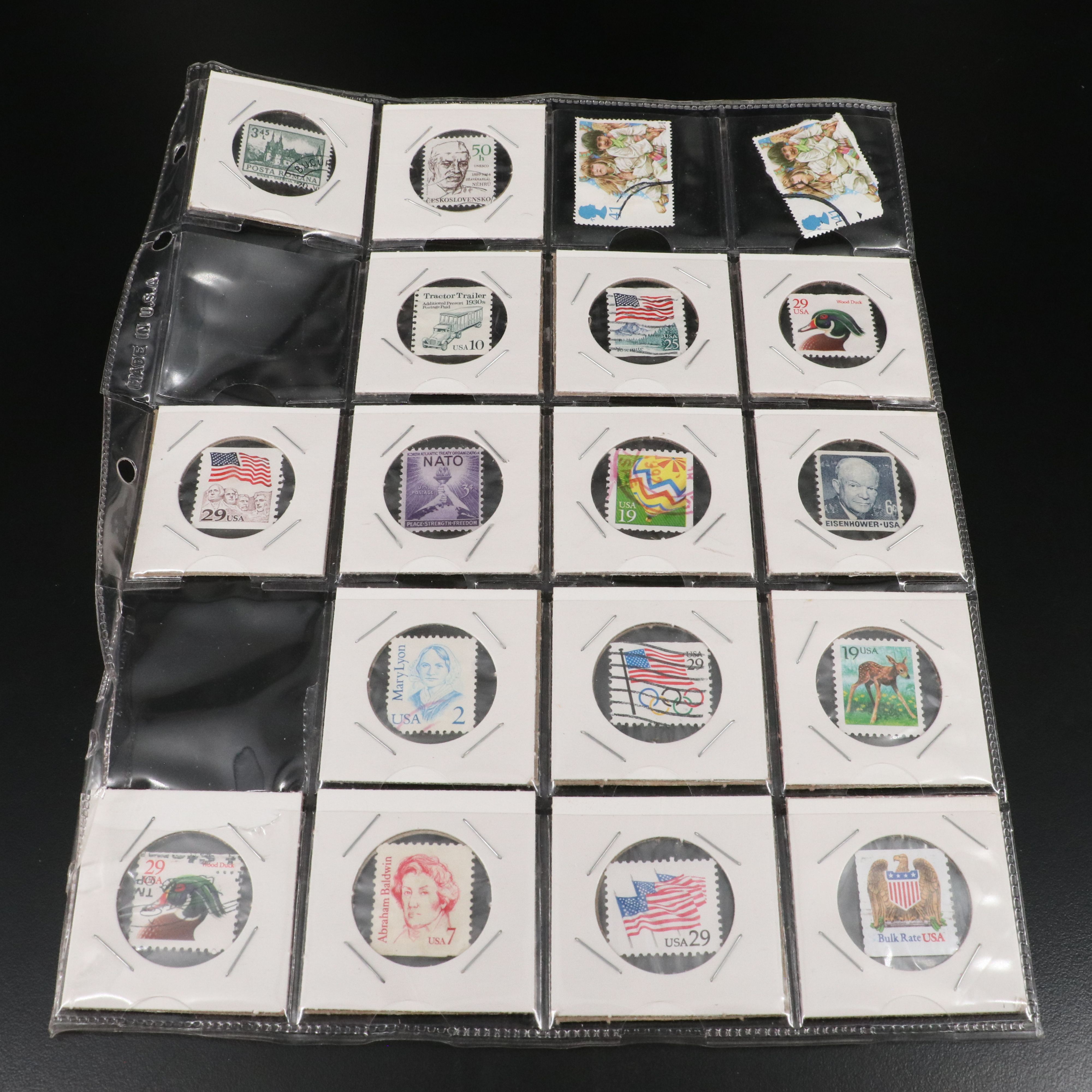 Four Album Pages of World and U.S. Postage Stamps