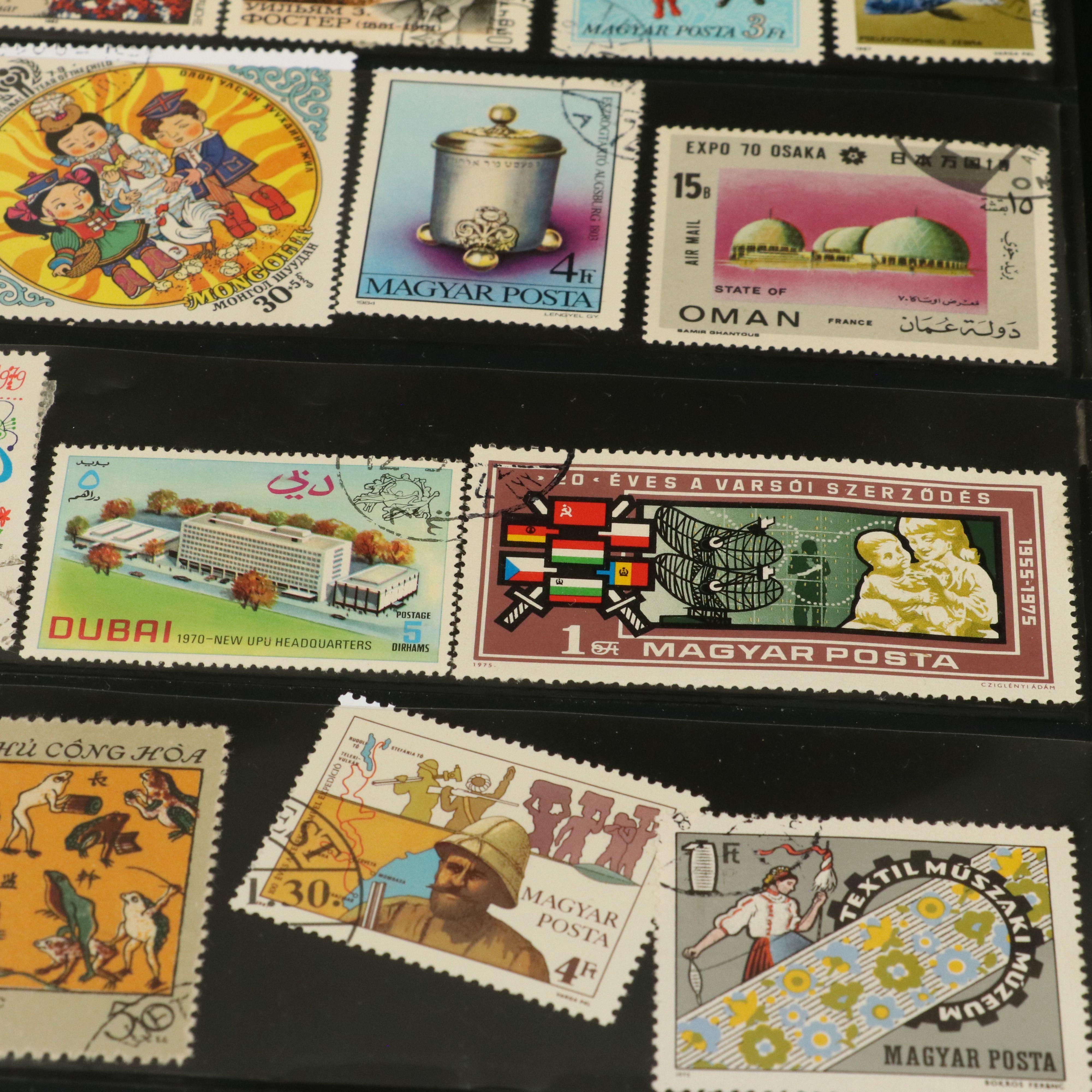 Four Album Pages of World and U.S. Postage Stamps