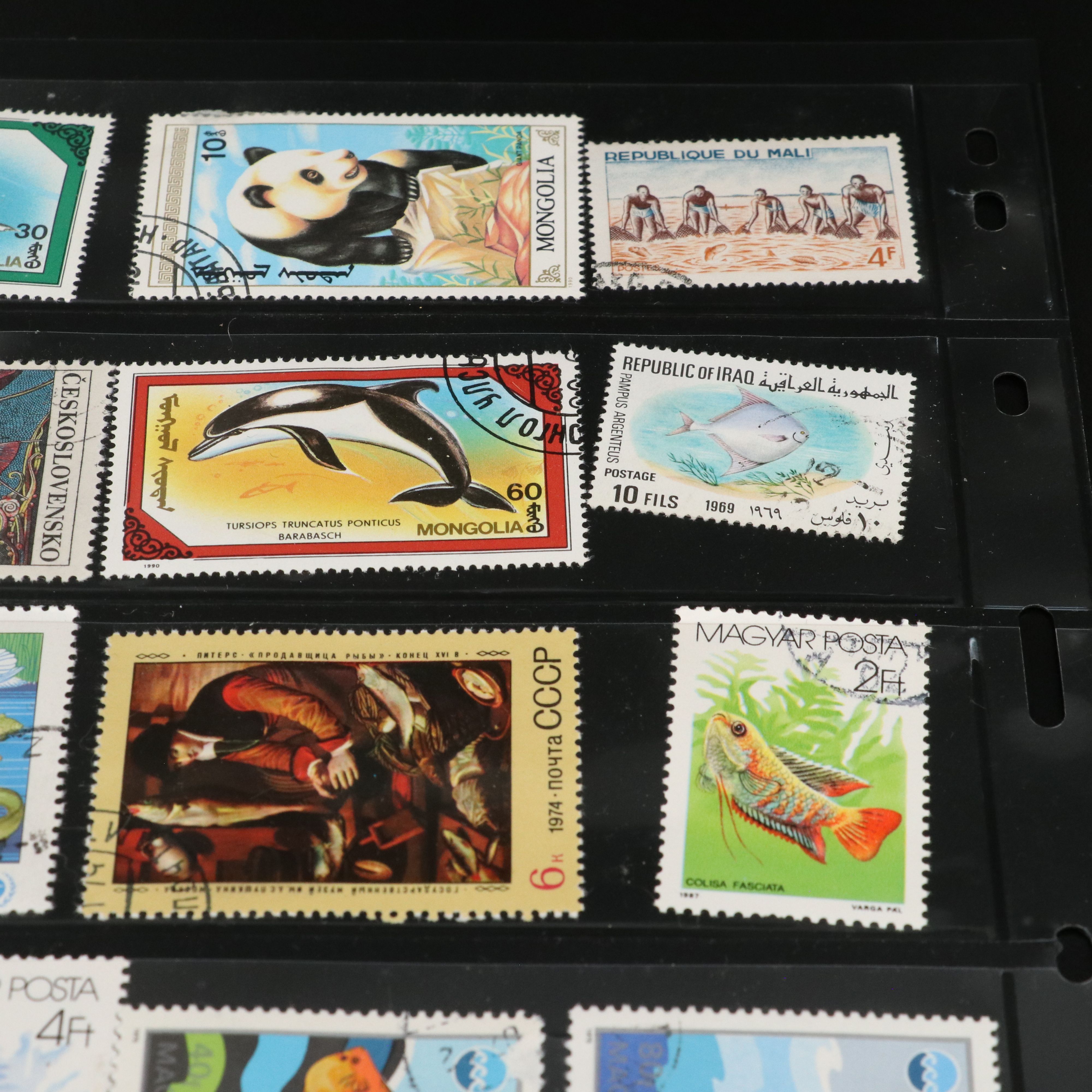 Four Album Pages of World and U.S. Postage Stamps