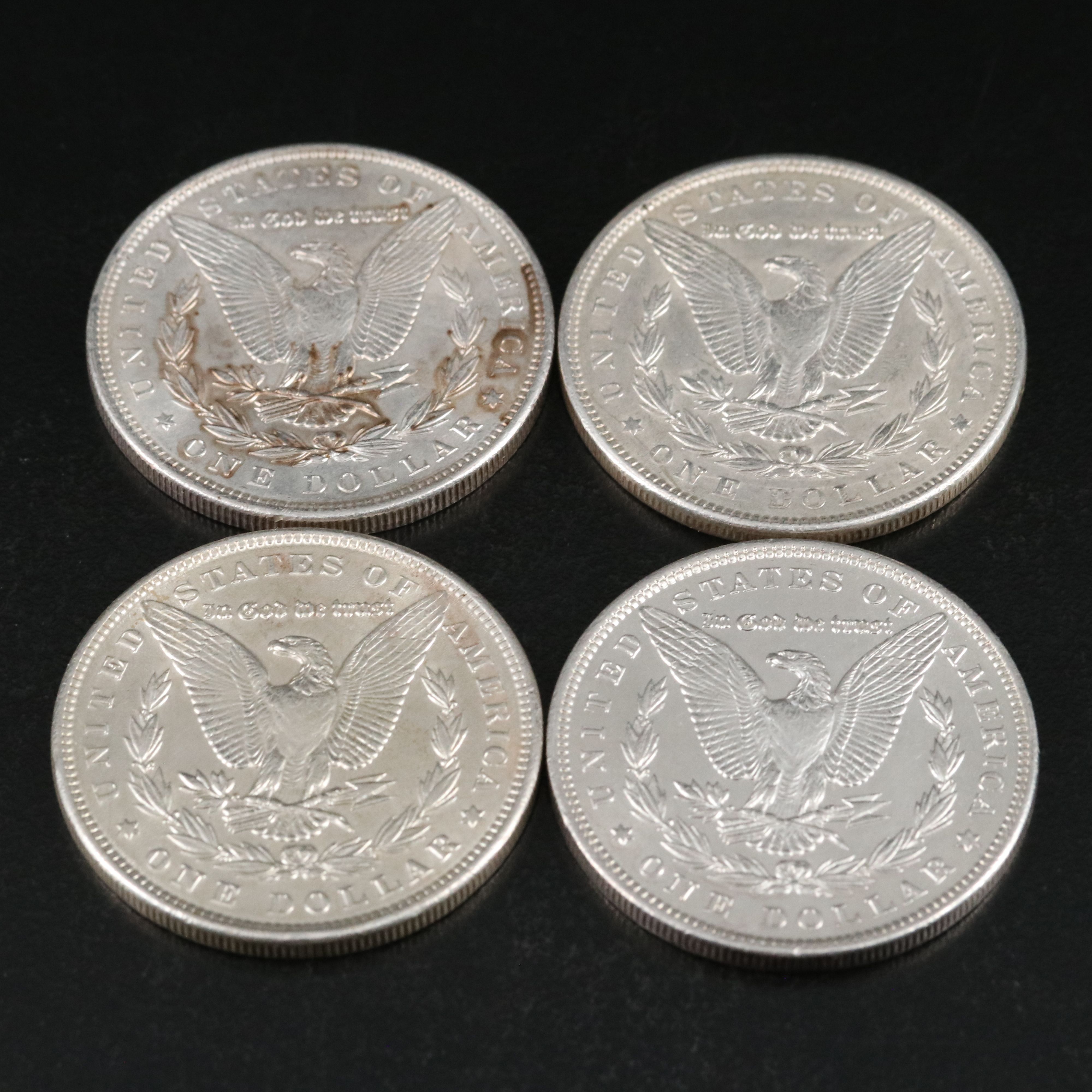 Group of Thirteen Morgan Silver Dollars Including an 1891-O