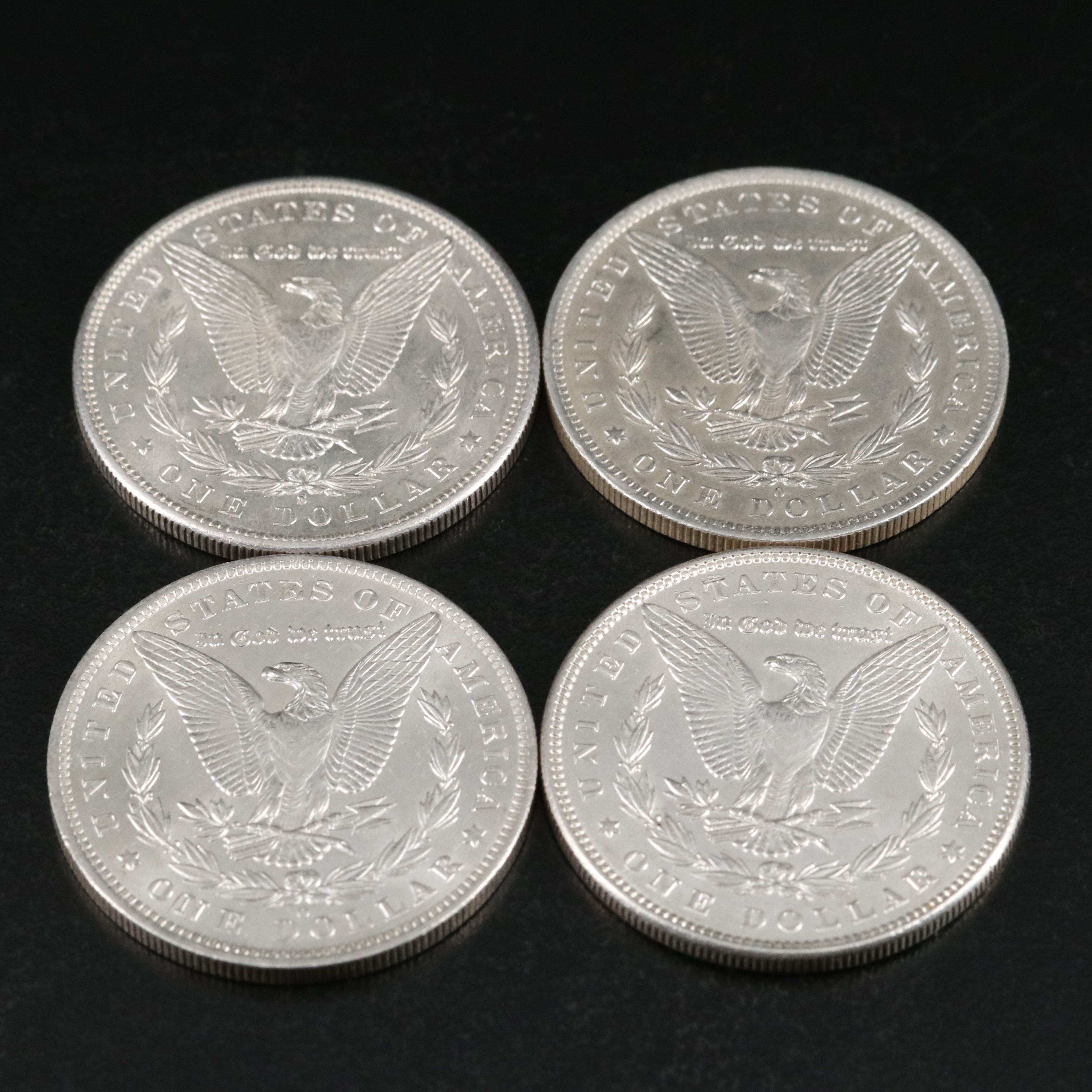 Group of Thirteen Morgan Silver Dollars Including an 1891-O