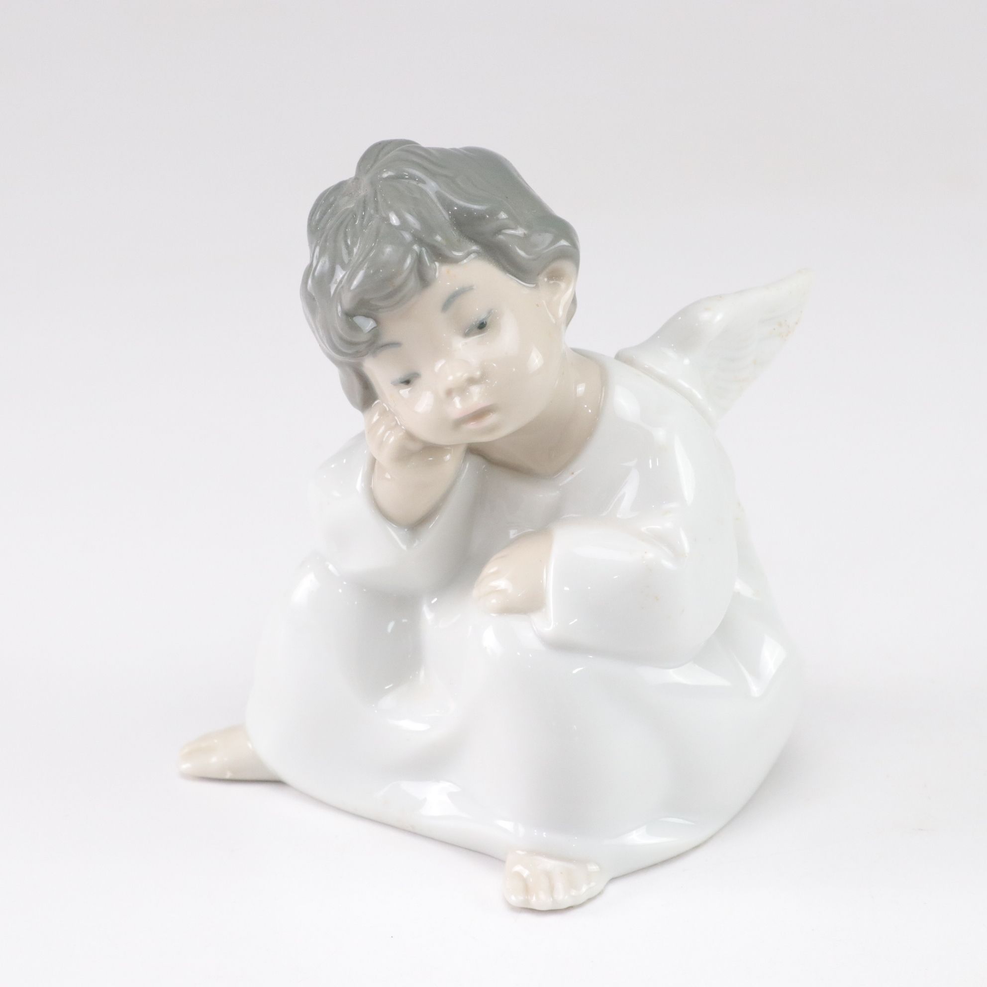 Lladro "Angel Thinking" and Belleek Figurines