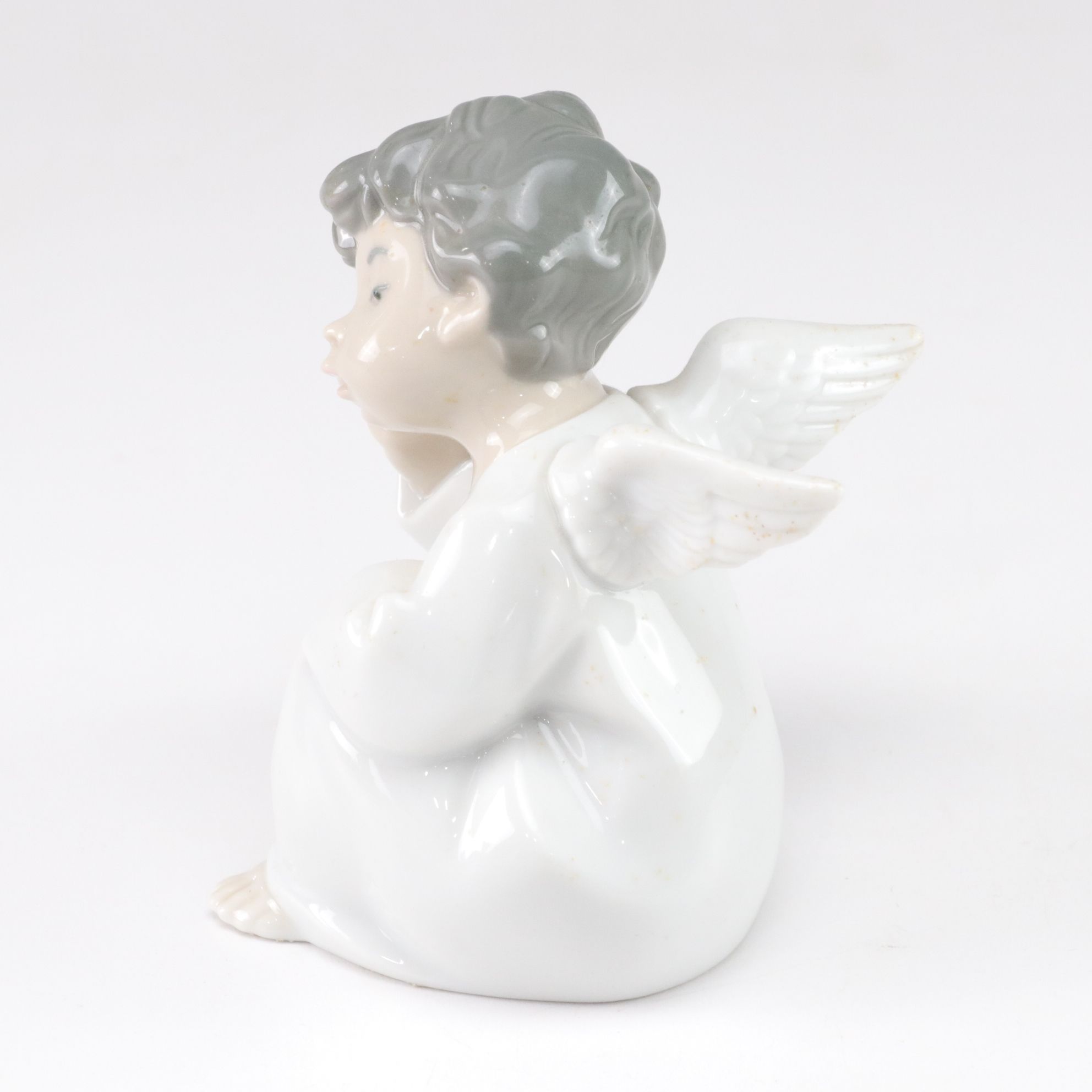 Lladro "Angel Thinking" and Belleek Figurines